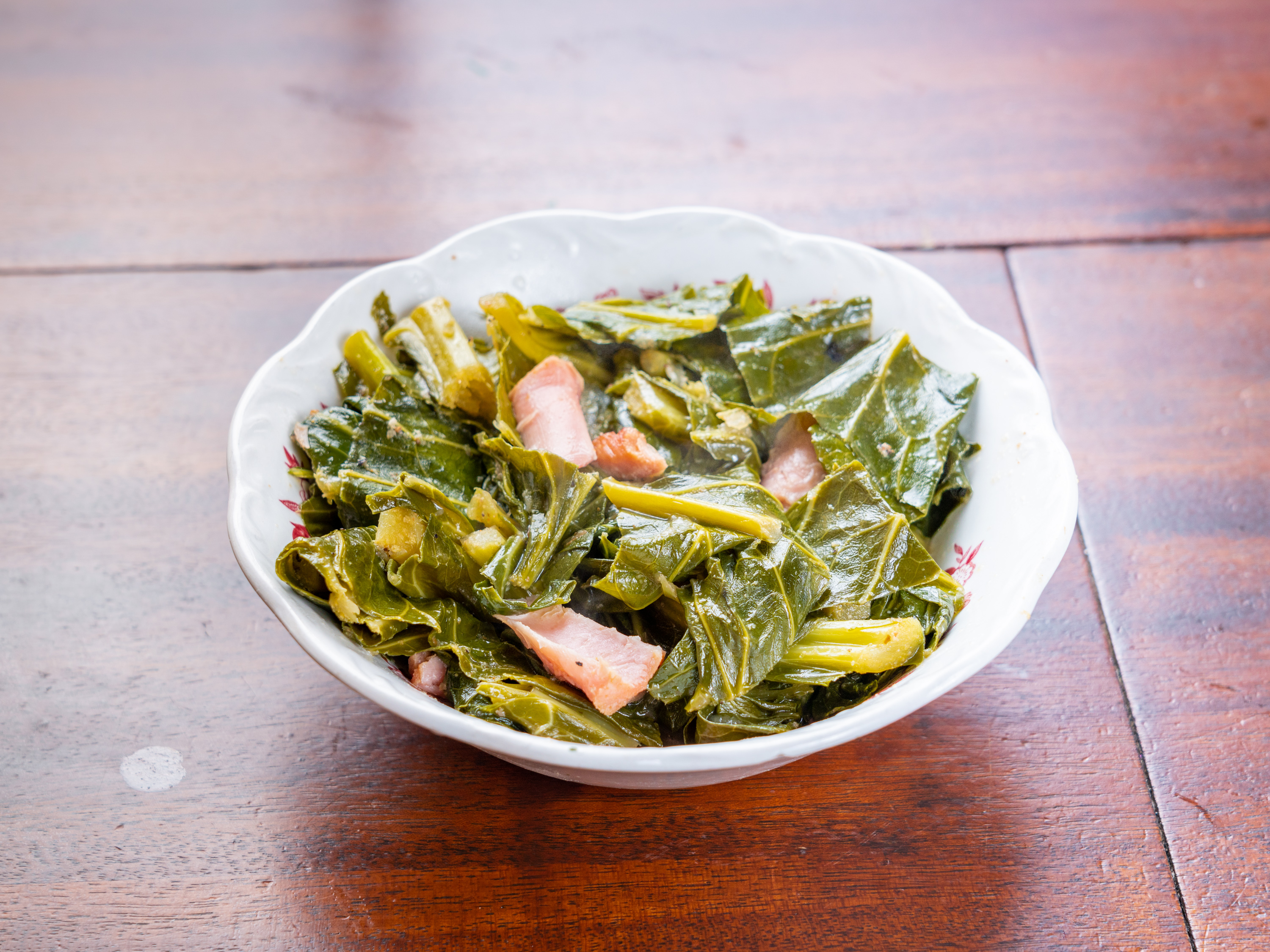 Order Collard Greens with Turkey food online from Lou Lou's Wings & Moore store, Lynbrook on bringmethat.com