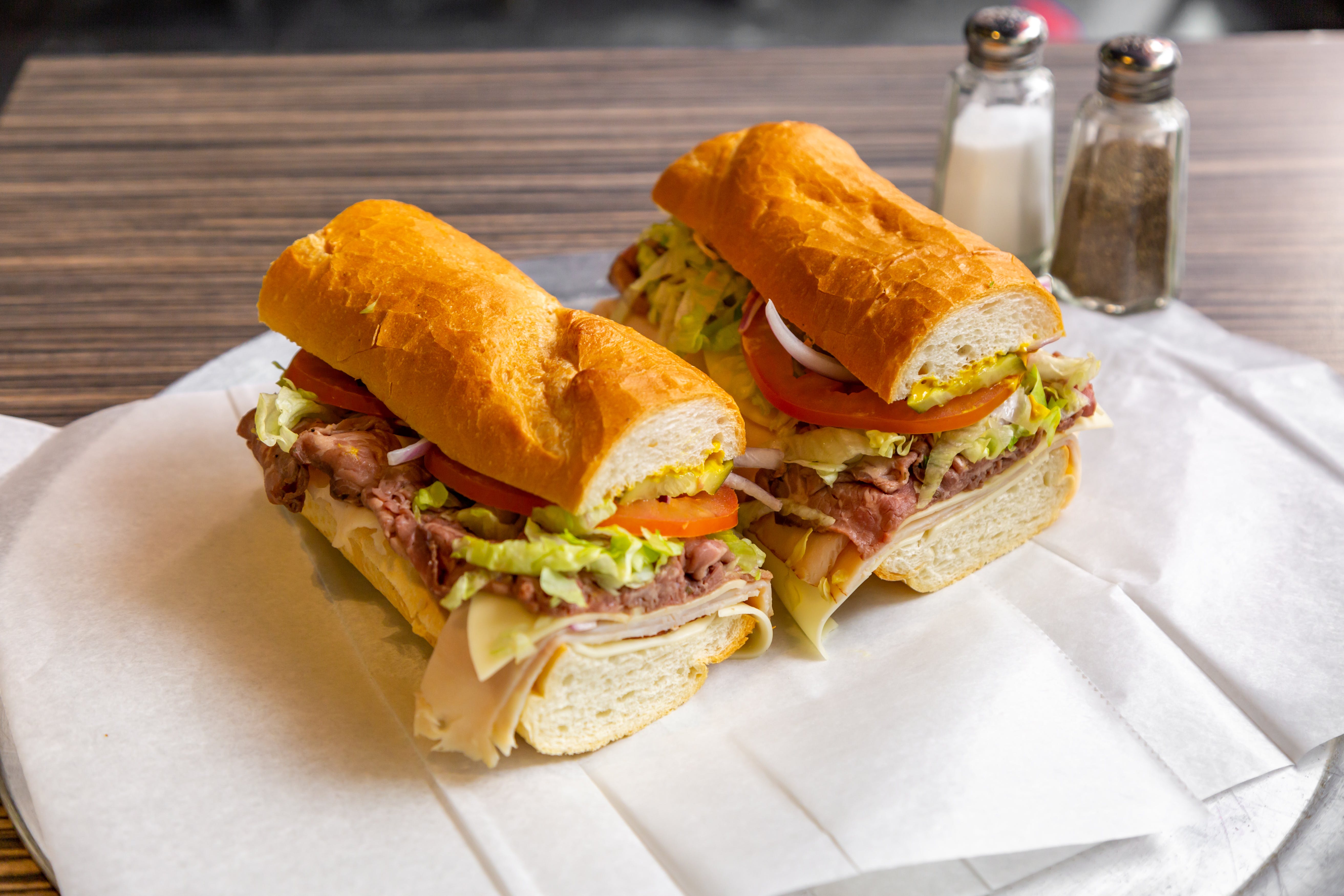 Order Roast Beef & Turkey Sub - Sub food online from Art of Pizza on State Street store, Chicago on bringmethat.com