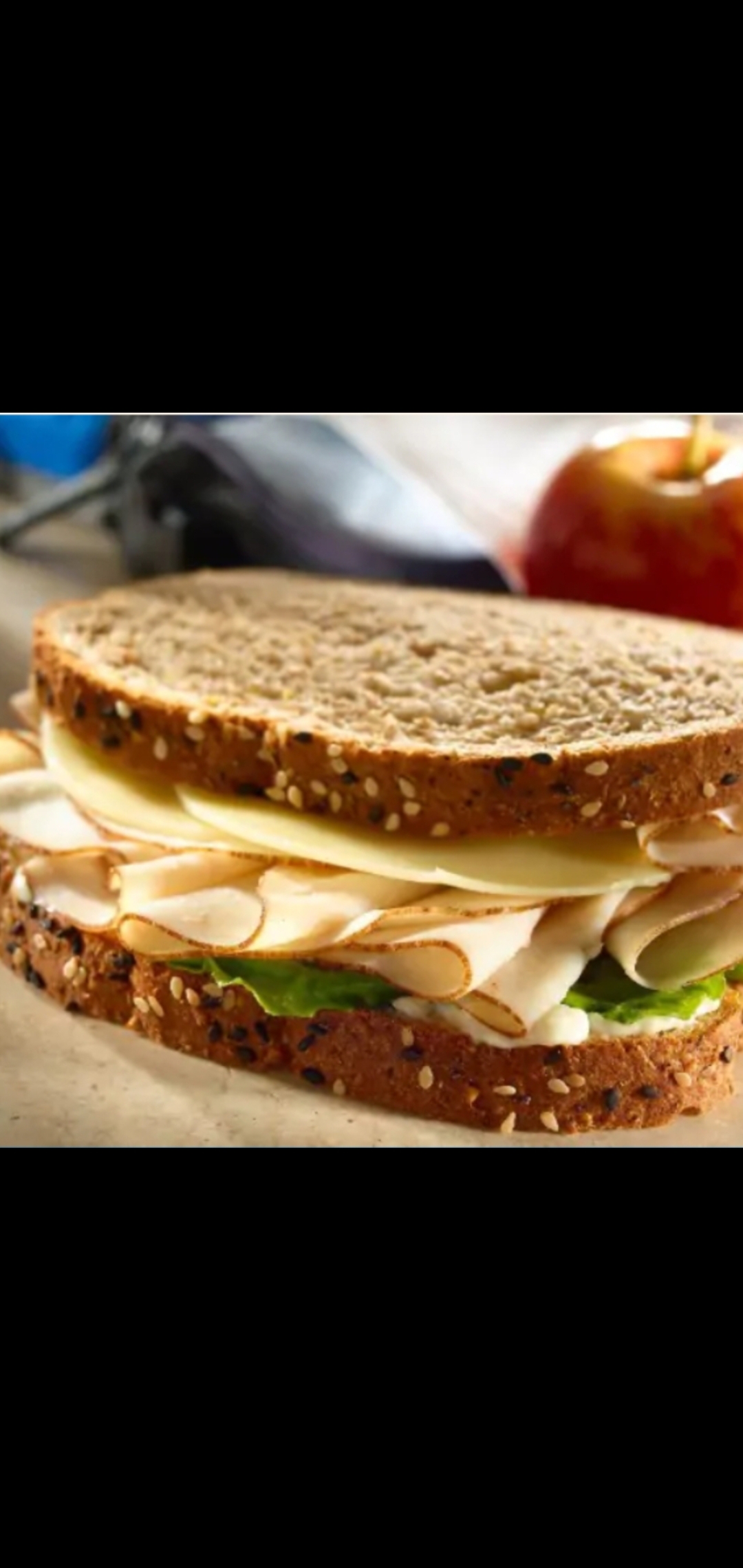 Order  Smoked Turkey Breast With Provolone Cheese & Romaine Lettuce Signature Sandwich  food online from American Gourmet Foods Deli store, New York on bringmethat.com