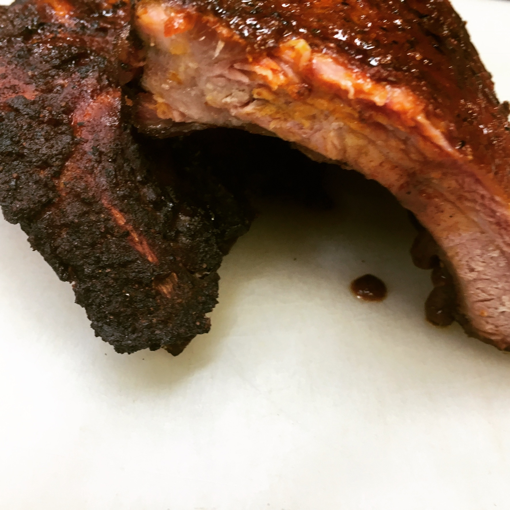 Order 1/2 Rack Bronco Ribs food online from Outlaw Potato Shack by Texas BBQ Joint  store, Rochester on bringmethat.com