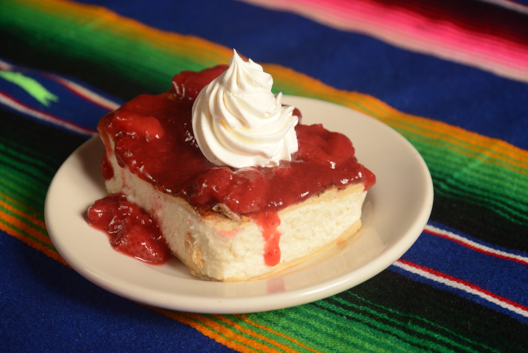 Order Sopapilla Cheesecake food online from Cafe Del Rio store, Lufkin on bringmethat.com