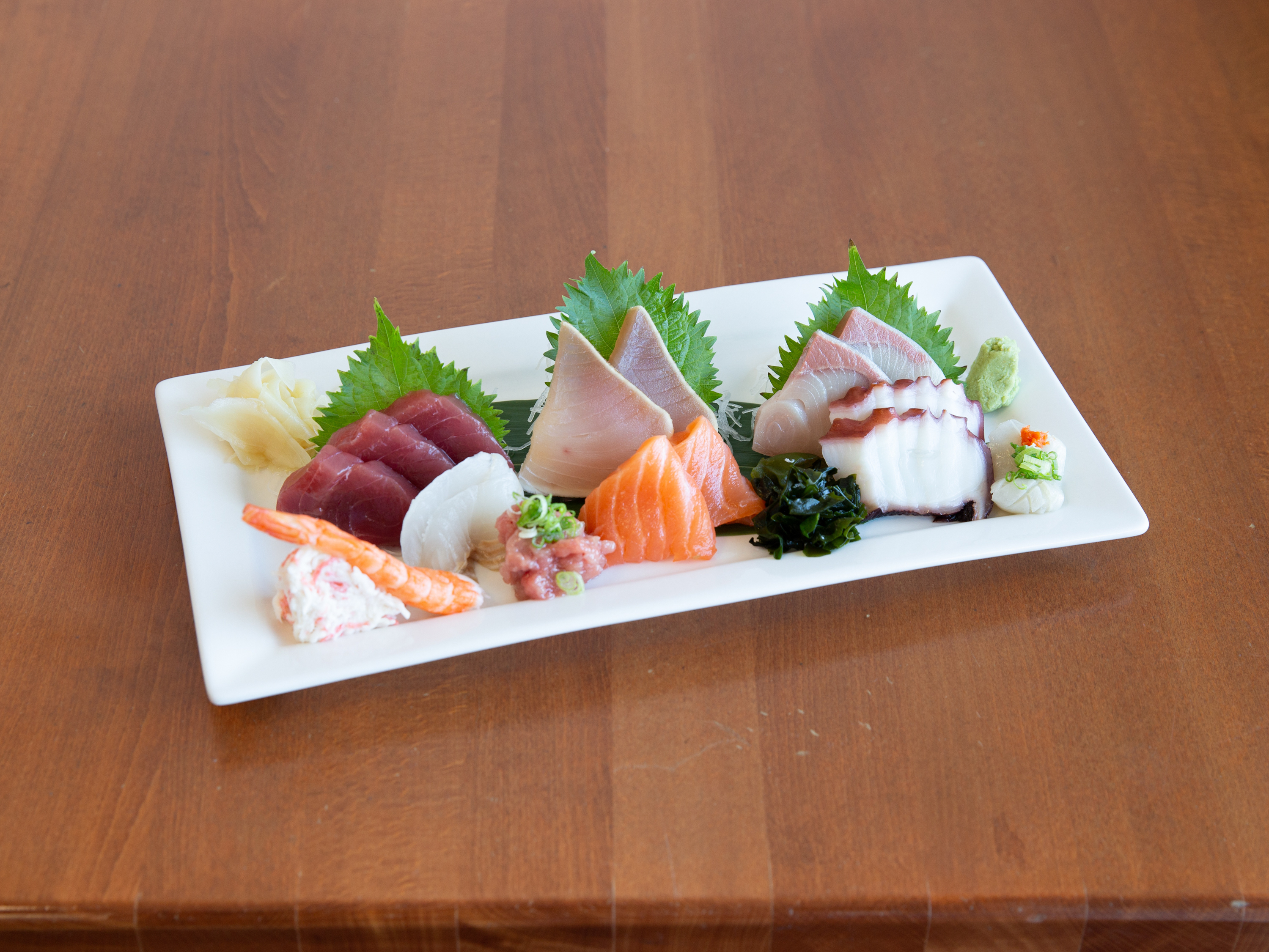 Order Sashimi Mix food online from Sushi Land store, Hacienda Heights on bringmethat.com