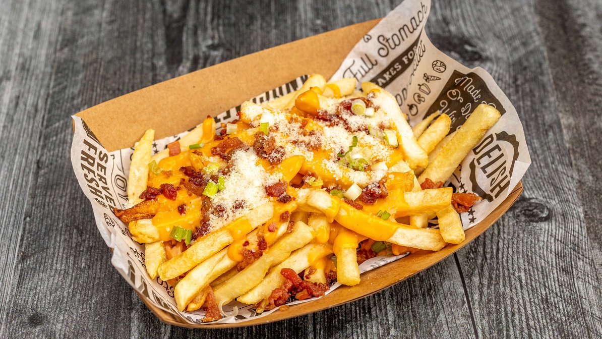 Order Fries Deluxe food online from Rock Club store, San Francisco on bringmethat.com