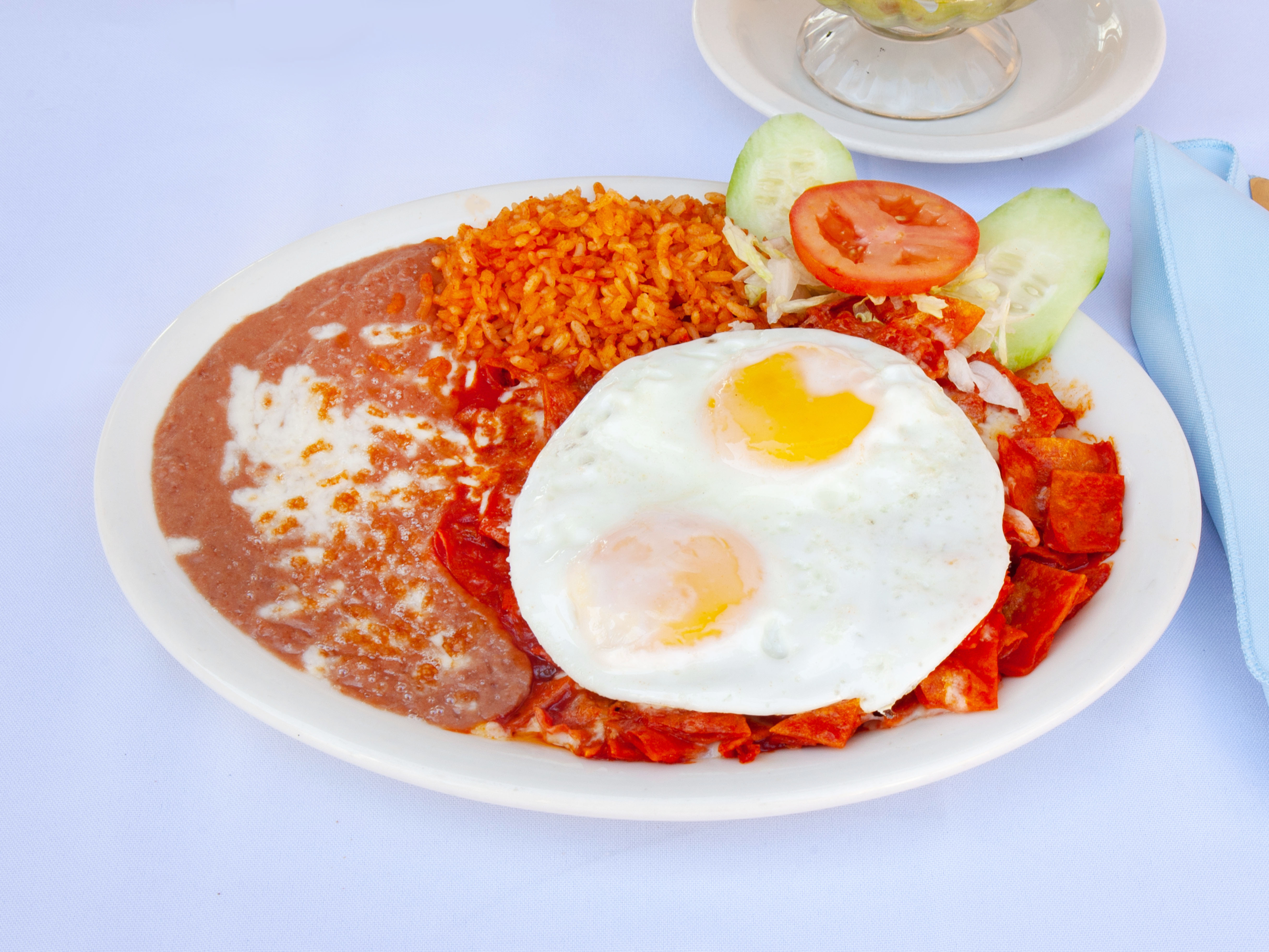 Order Chilaquiles Breakfast food online from Las Trancas store, Maywood on bringmethat.com