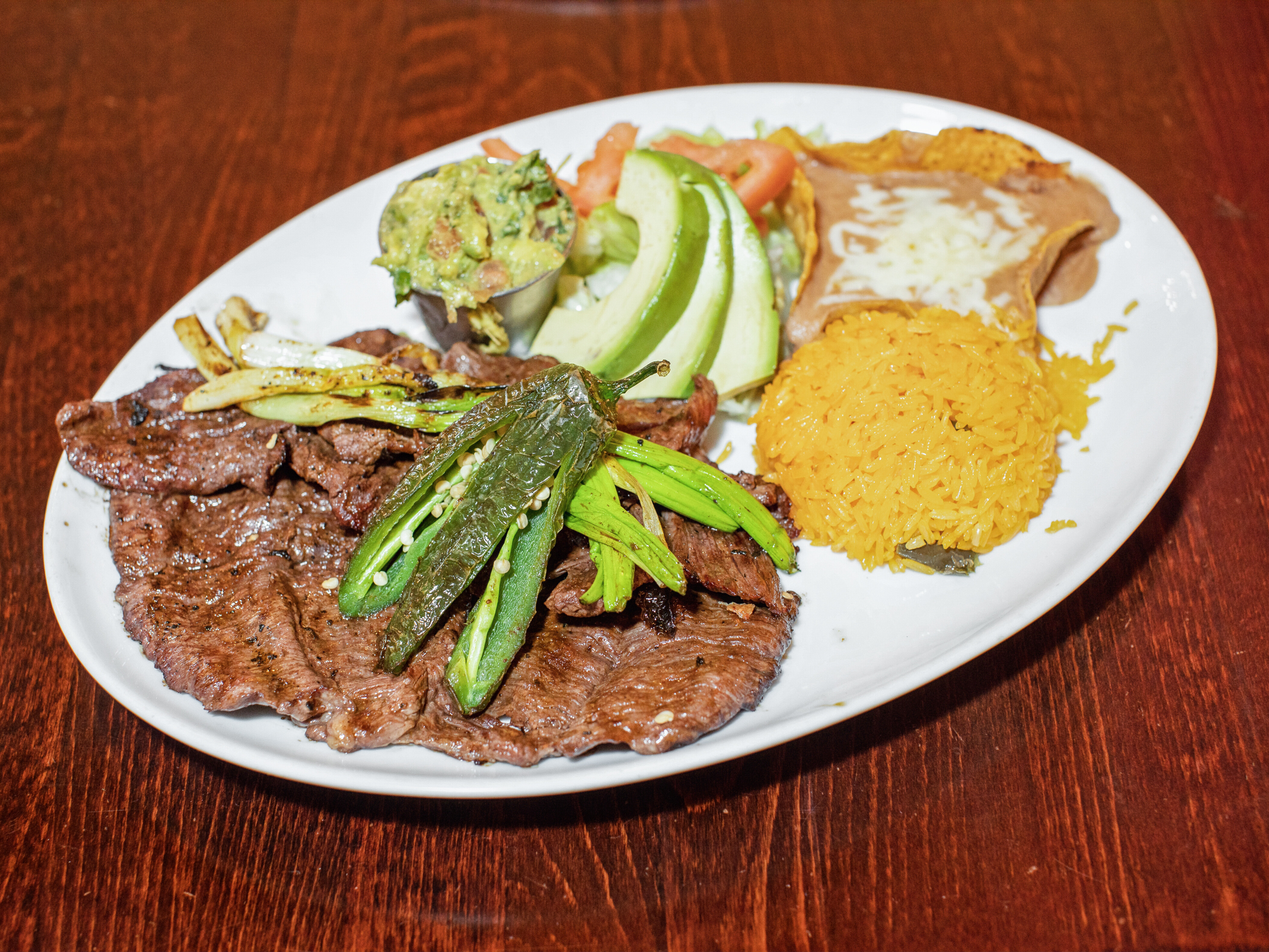 Order Carne Asada food online from Casa Blanca Mexican Restaurant store, North Billerica on bringmethat.com