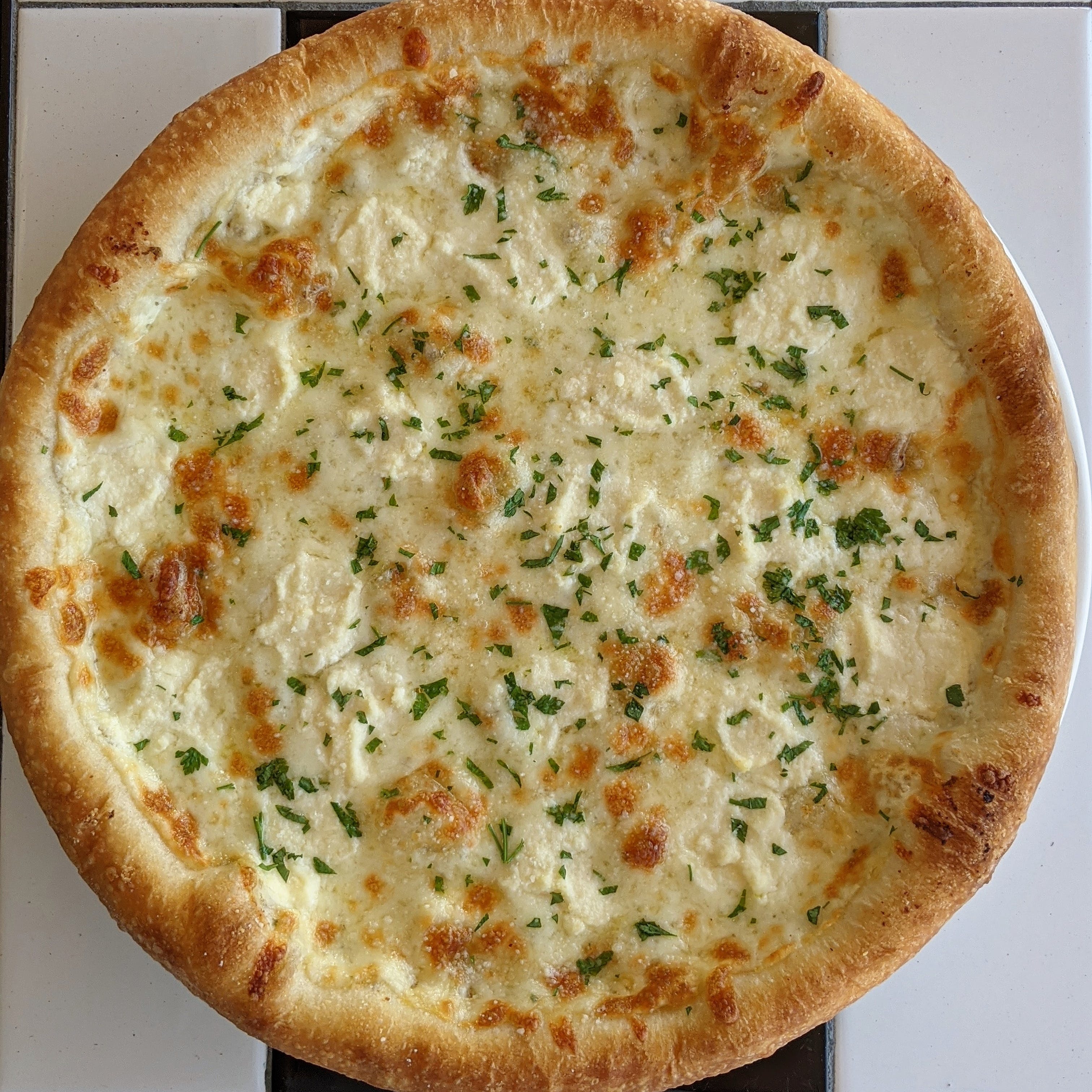 Order White Pizza - Medium 14" food online from Lucino Pizza store, Las Vegas on bringmethat.com