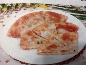 Order K13. Green Onion Pie 葱油饼 food online from Garage Restaurant store, San Gabriel on bringmethat.com