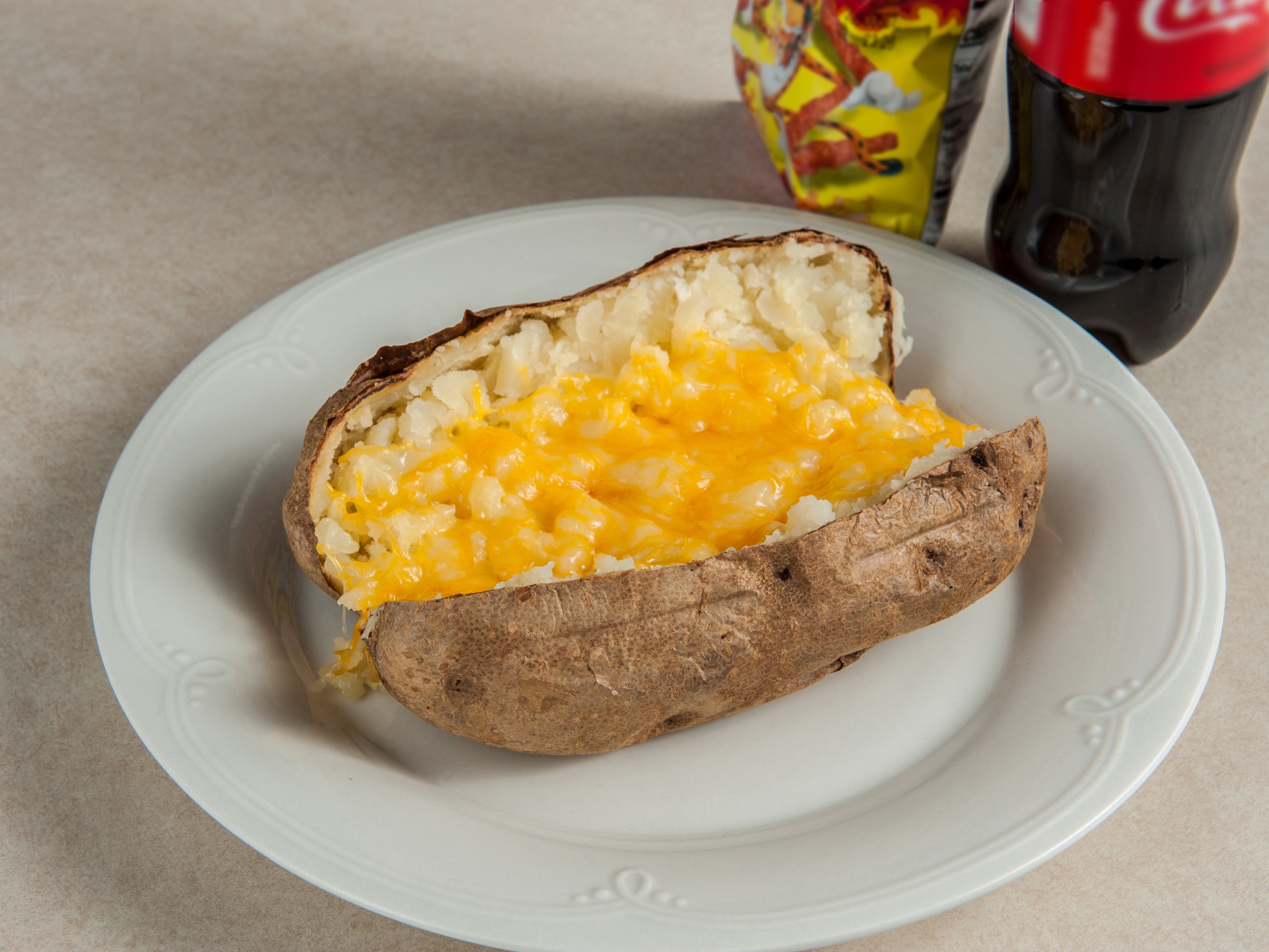 Order Plain Potato Combo ( chips and drink )  food online from Hot Potato Bar store, Wichita on bringmethat.com