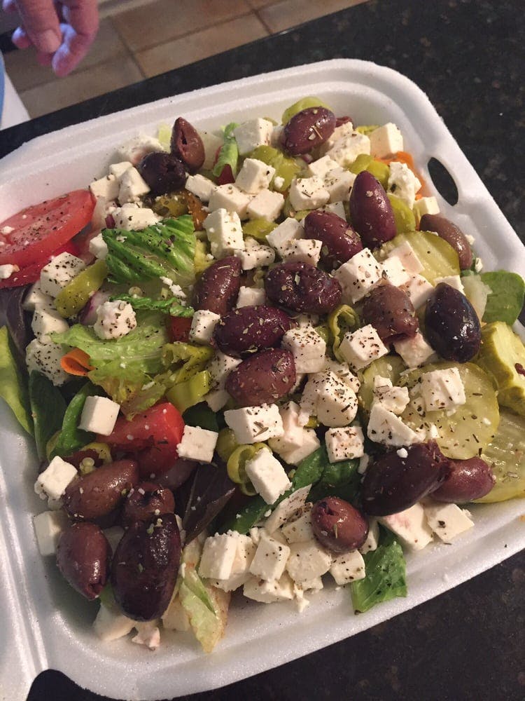 Order Greek Salad - Large food online from Bravo Pizza store, Pottstown on bringmethat.com