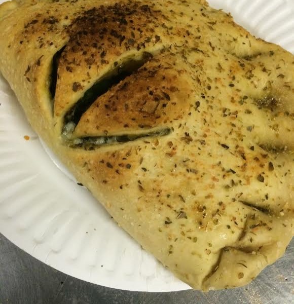 Order Gianni's Famous Calzone food online from Gianni's Pizza store, Oceanside on bringmethat.com