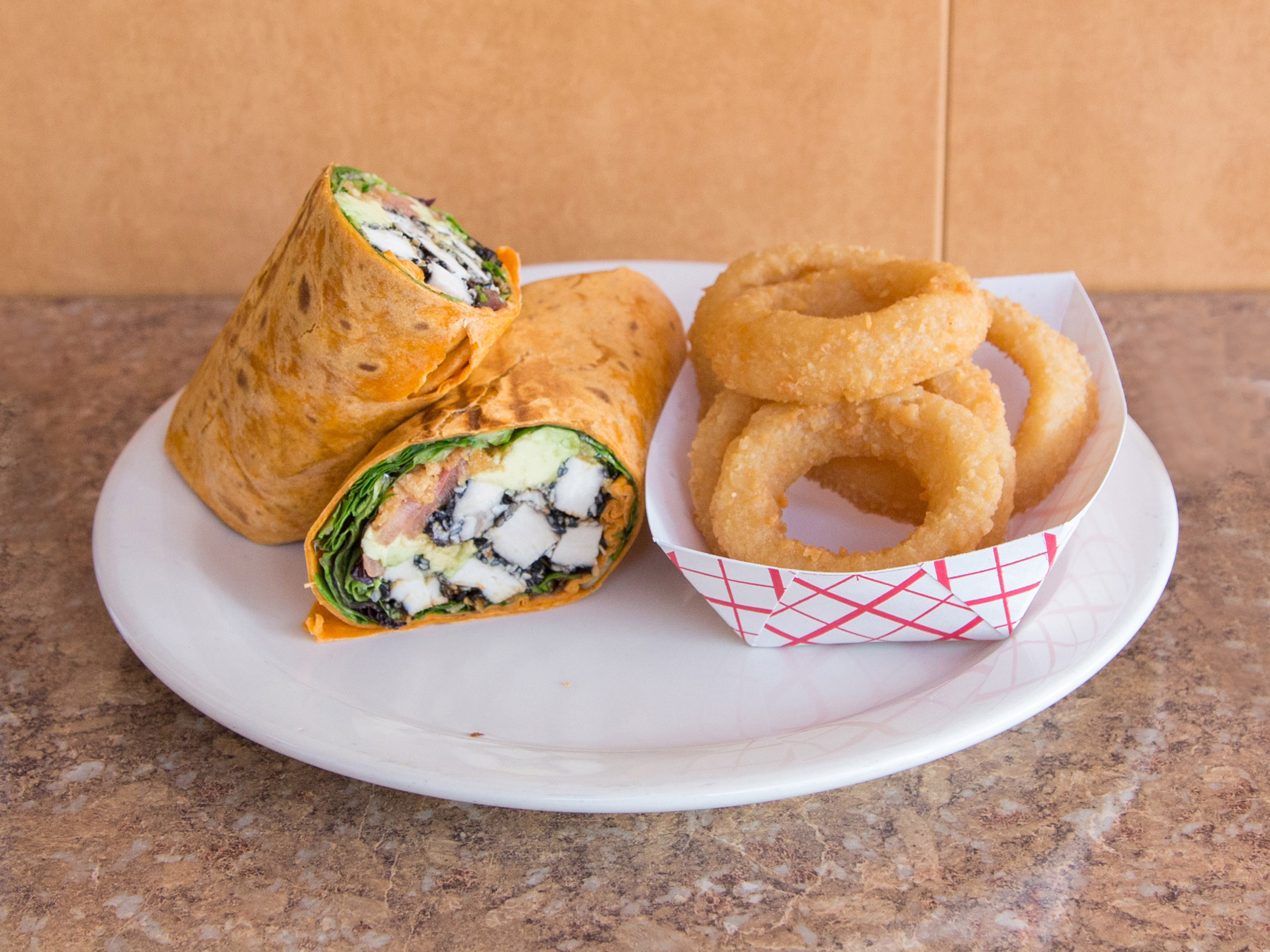 Order Seared Sesame Chicken Wrap Combo food online from The Pit Stop store, Merrick on bringmethat.com