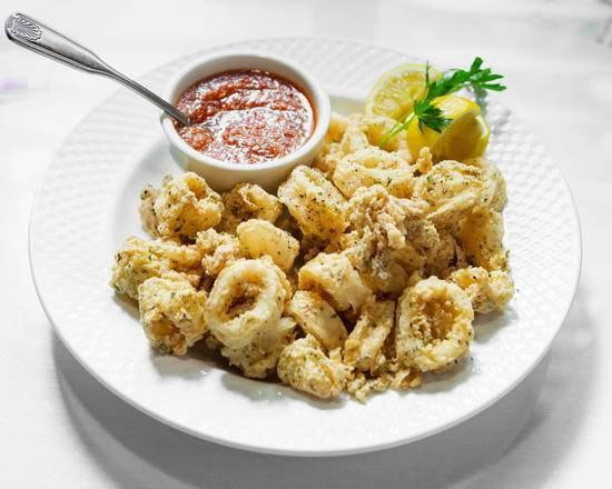 Order L-Fried Calamari food online from Reales Italian Cafe store, Austin on bringmethat.com