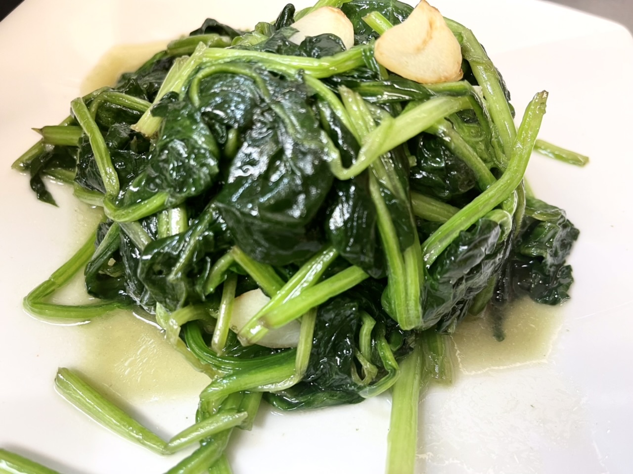 Order 409. Sauteed Spinach with Garlic food online from Land Of Plenty store, New York on bringmethat.com