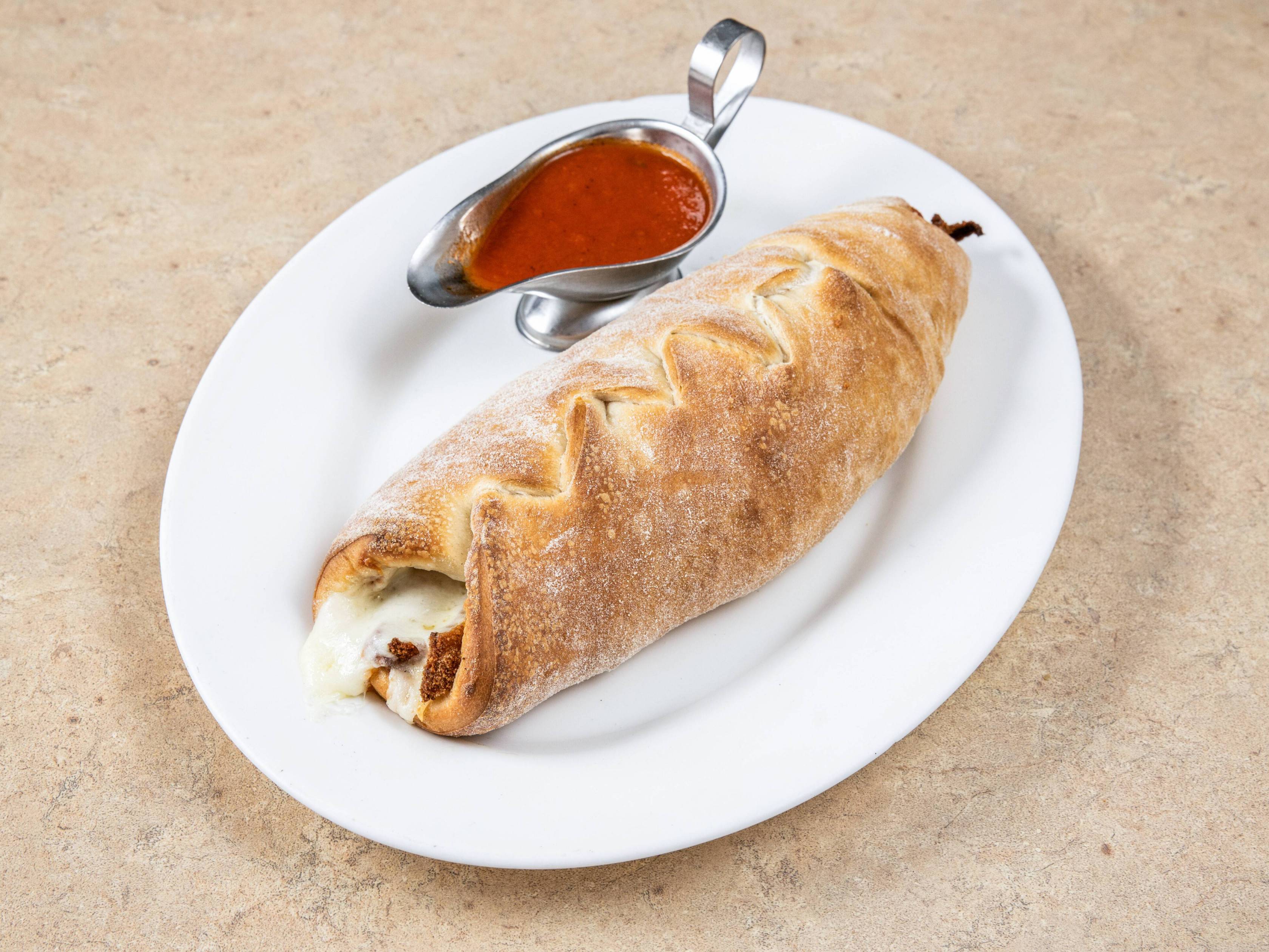 Order Meat Stromboli food online from Frank's Trattoria store, Caldwell on bringmethat.com