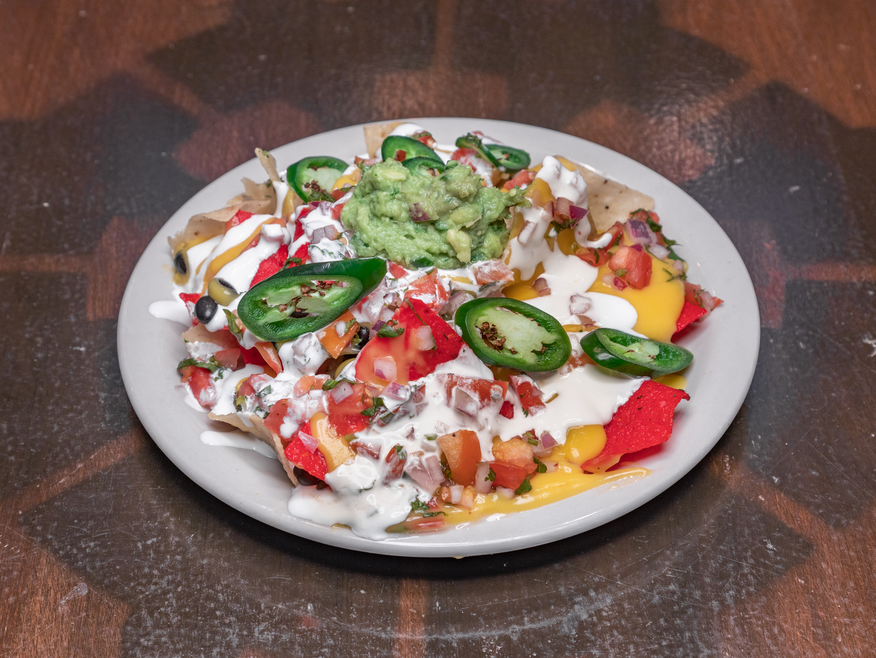 Order Loaded Nachos food online from Wicked Willy's store, New York on bringmethat.com