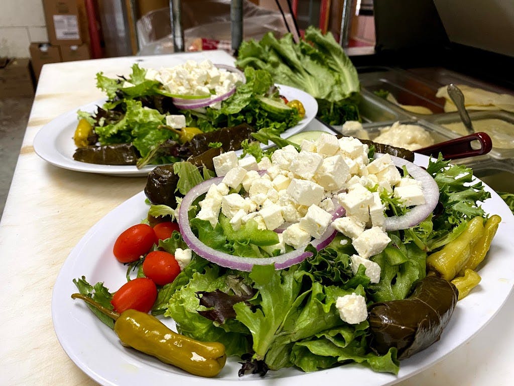 Order Greek Salad - Salad food online from Empire Pizza Restaurant store, Pittsfield on bringmethat.com
