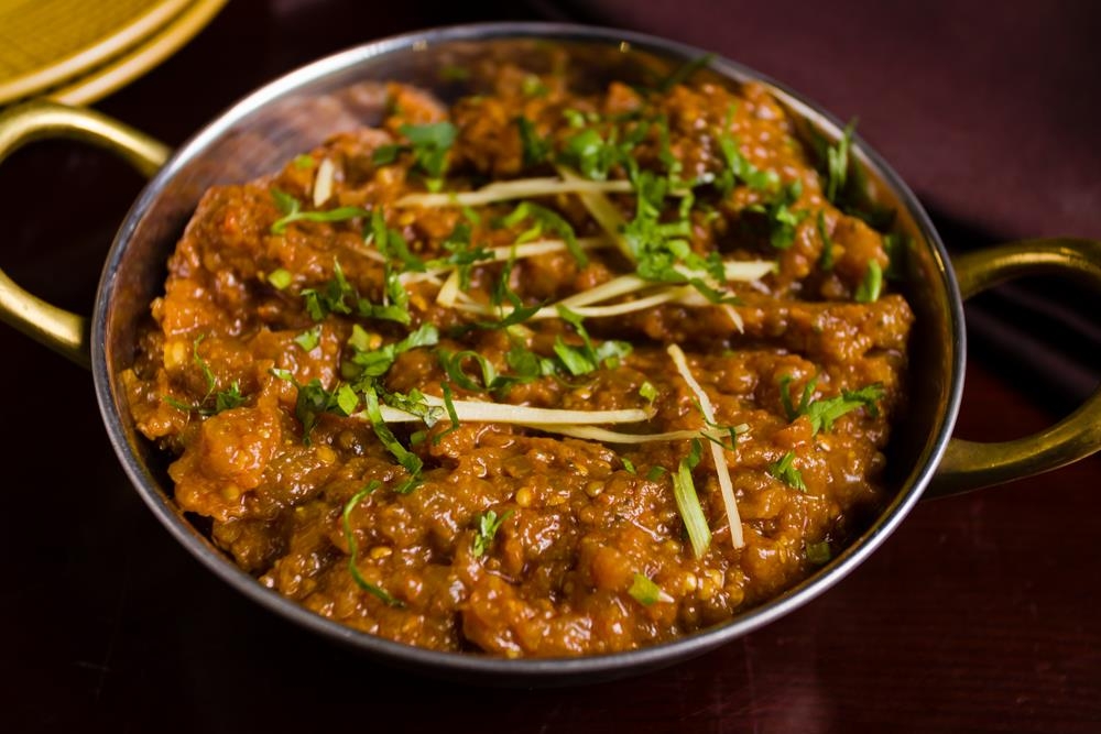 Order Baigan da Bharta food online from Dhaba indian cuisine store, New York on bringmethat.com