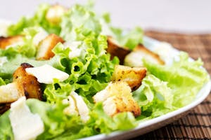 Order Caesar Salad w/ House-made croutons, Parmesan (House-made Caesar) food online from Milano Cafe & Deli store, Burbank on bringmethat.com