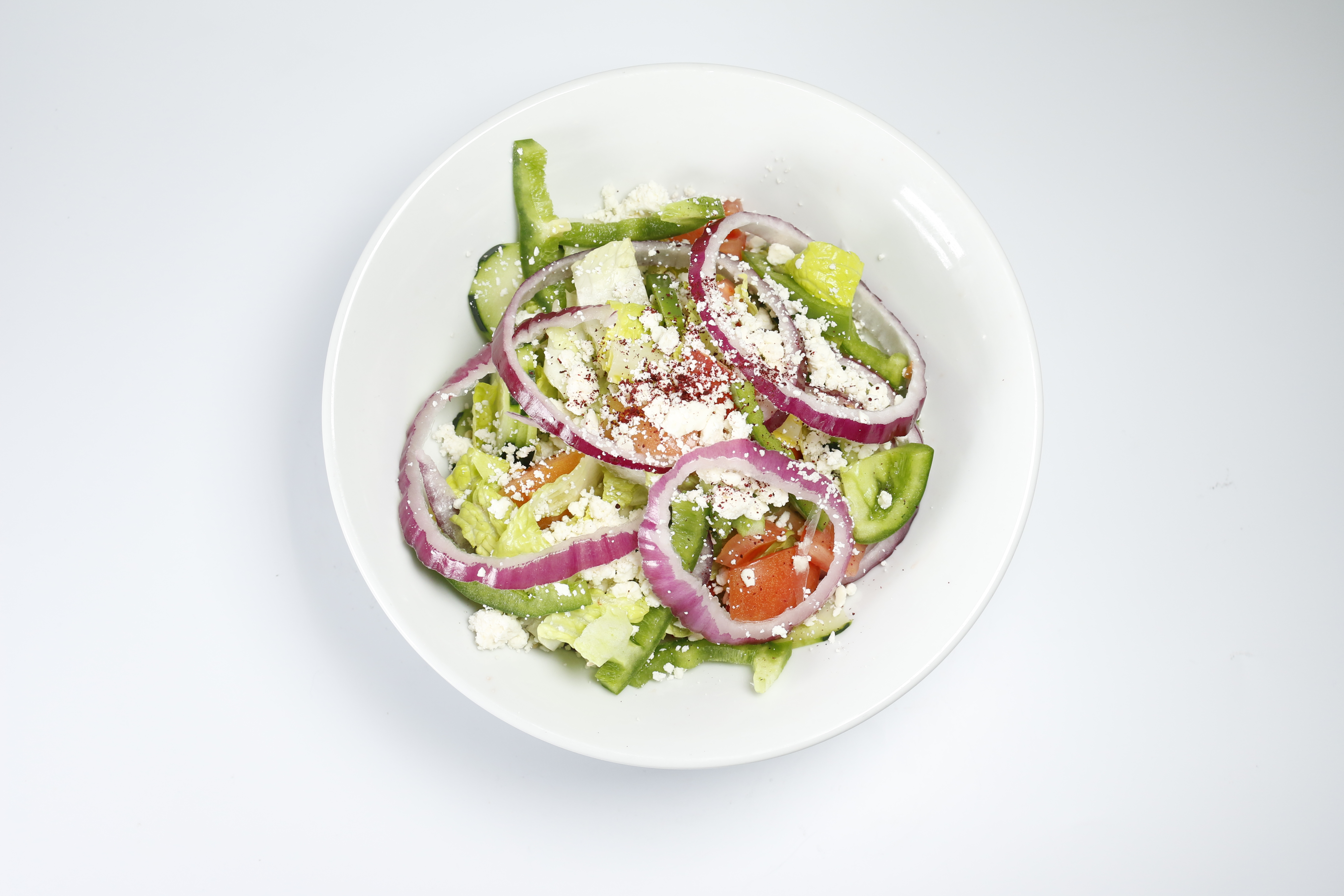 Order Greek Salad food online from Wing Pop By Gyro Express store, San Francisco on bringmethat.com
