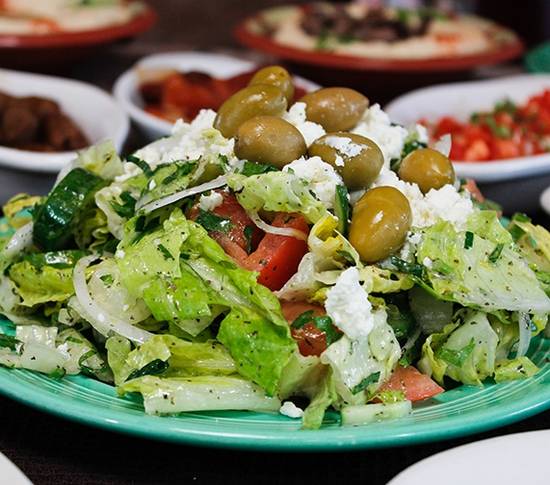 Order Greek Salad food online from Sunnin Lebanese Cafe store, Los Angeles on bringmethat.com