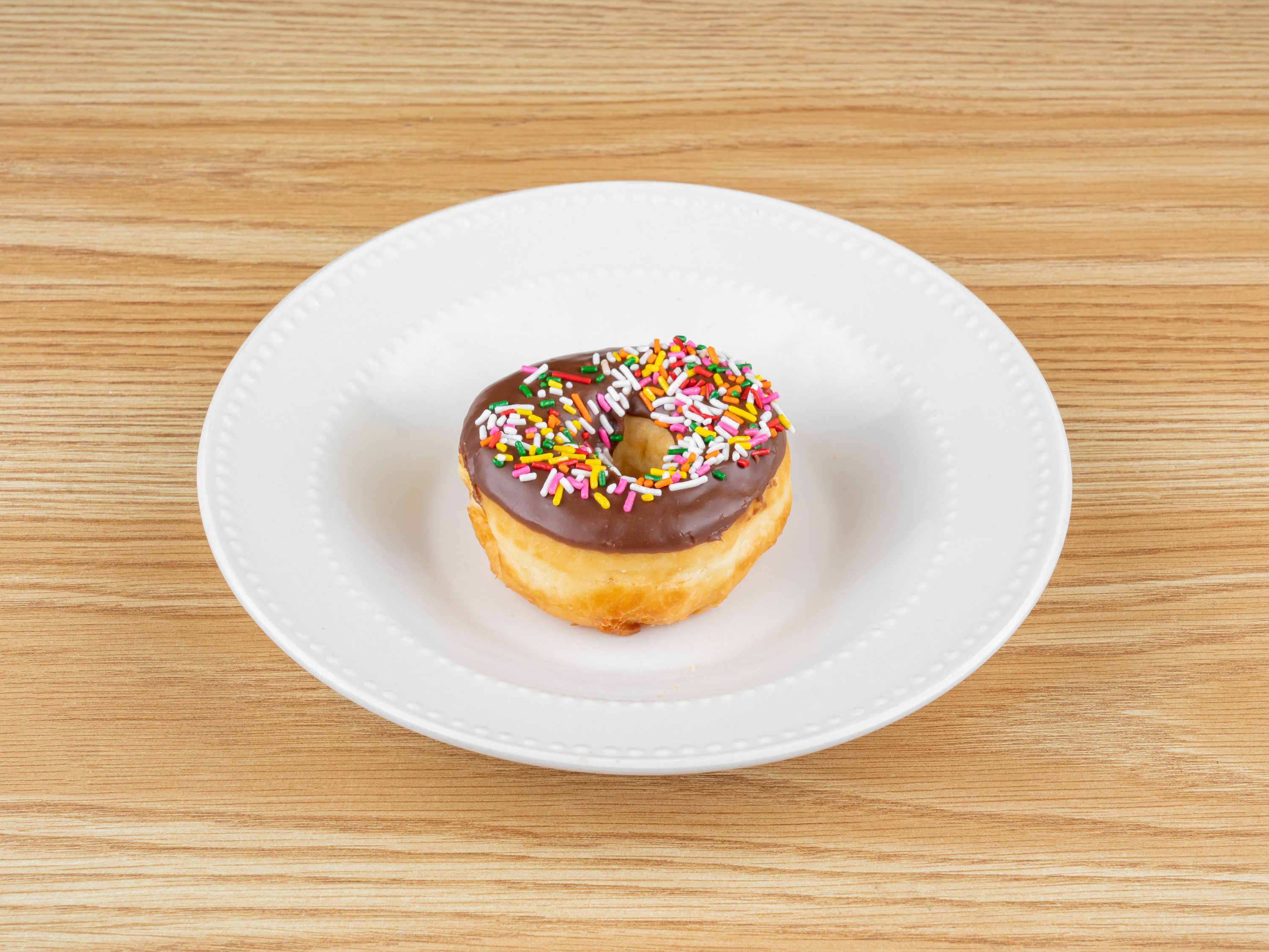 Order Sprinkle Donut food online from Goodies Donuts store, Rosharon on bringmethat.com