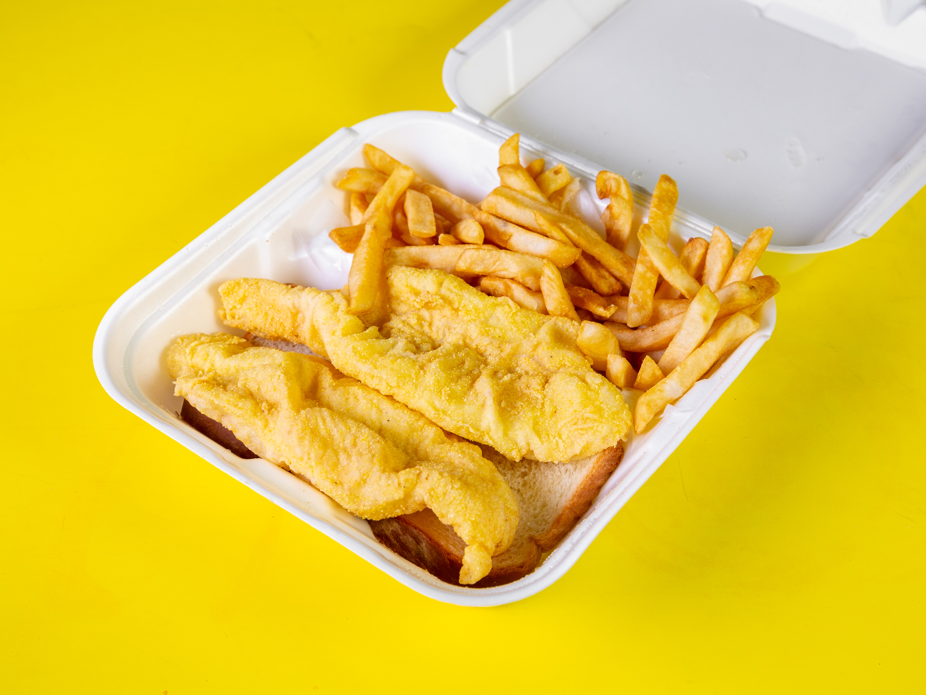 Order 3pcCatfish Filets Dinner food online from Hook Fish &Chicken store, Cincinnati on bringmethat.com