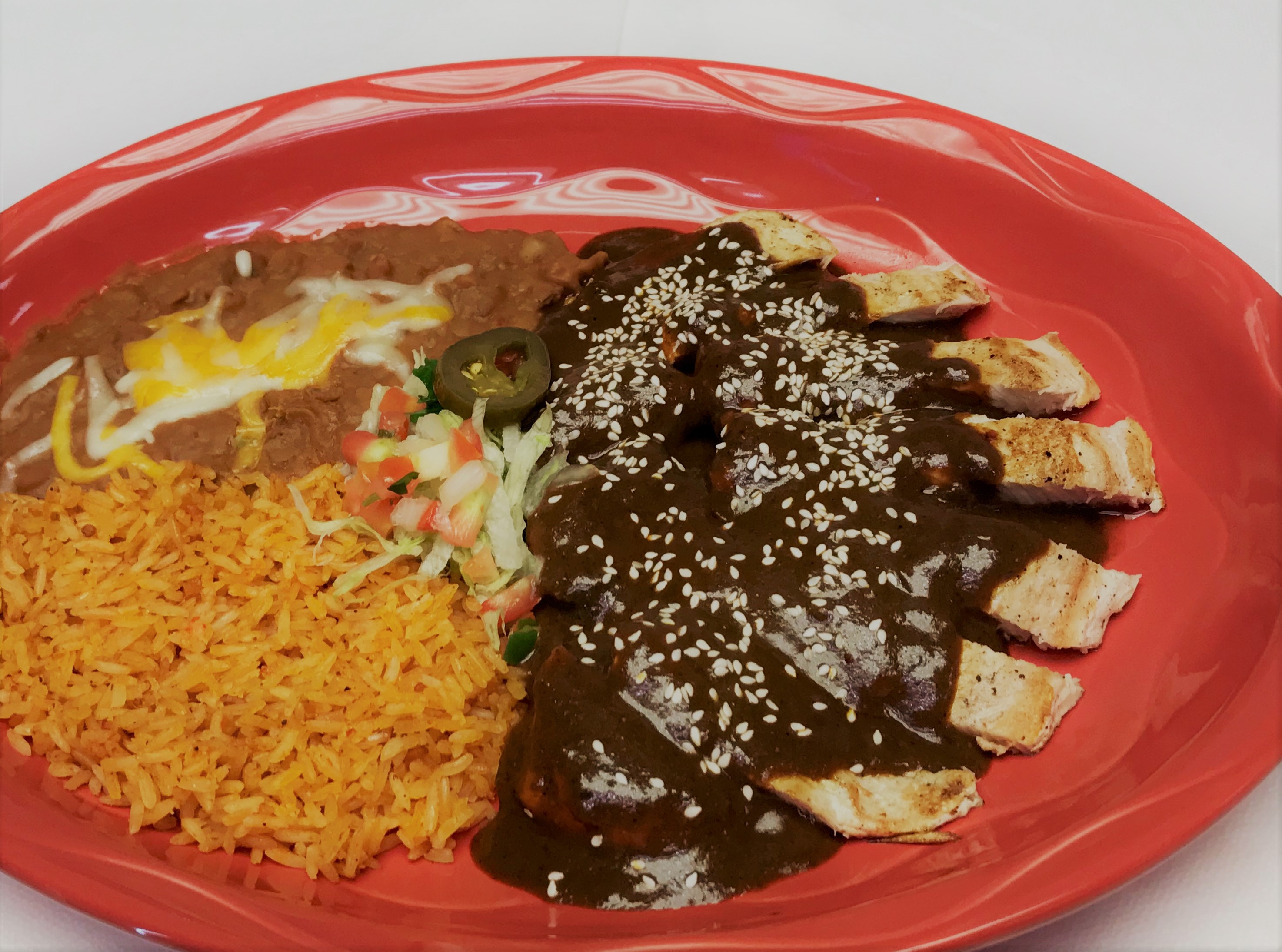 Order Pollo en Mole  food online from Guadalajara Fiesta Grill store, Tucson on bringmethat.com