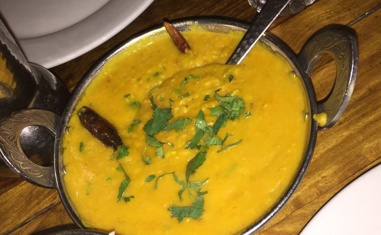 Order Dal Tadka food online from Mughlai Indian Cuisine store, New York on bringmethat.com