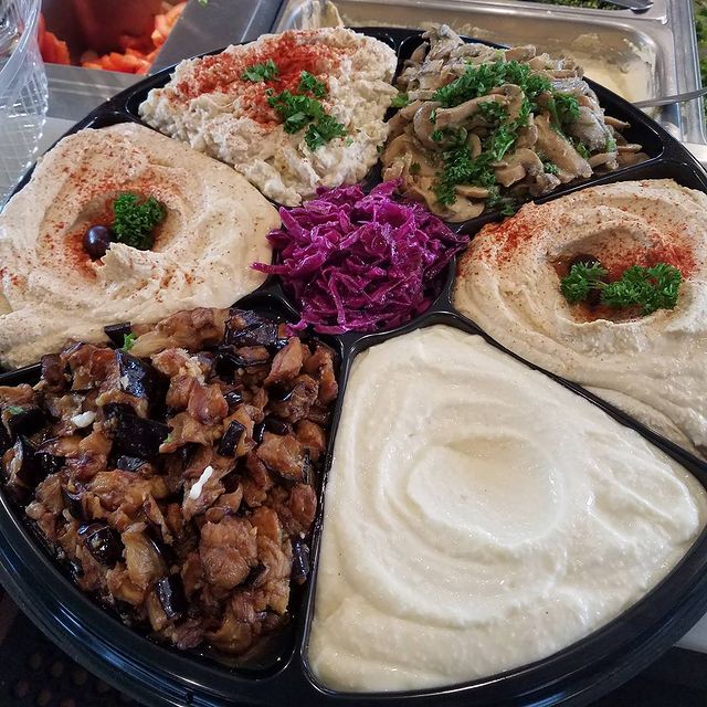 Order Vegetarian Mezze Feast Family Meal (5-6 people) food online from Falafel Palace store, Los Angeles on bringmethat.com