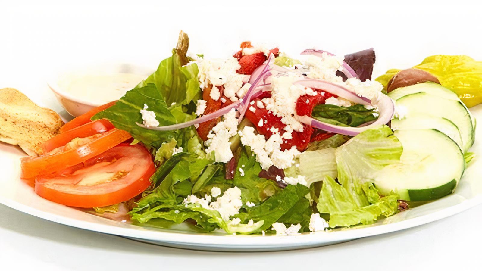 Order Greek Salad food online from Taziki Mediterranean Cafe store, Atlanta on bringmethat.com