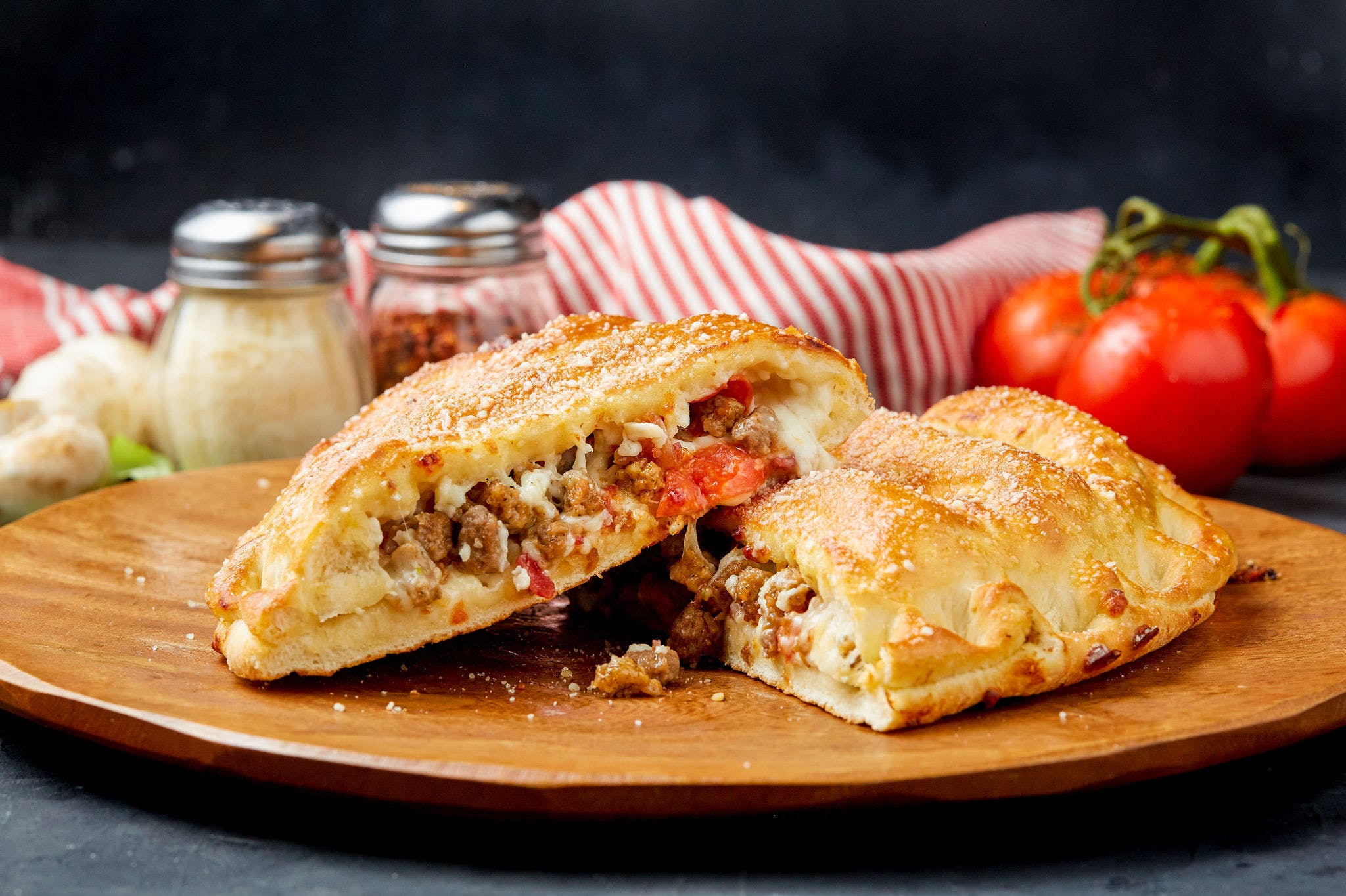 Order 6 Meat Calzone - Calzone food online from Simple Simon's Pizza store, Bartlesville on bringmethat.com