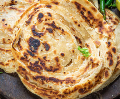 Order Laccha Paratha food online from Spicelife Indian Fare store, Gaithersburg on bringmethat.com