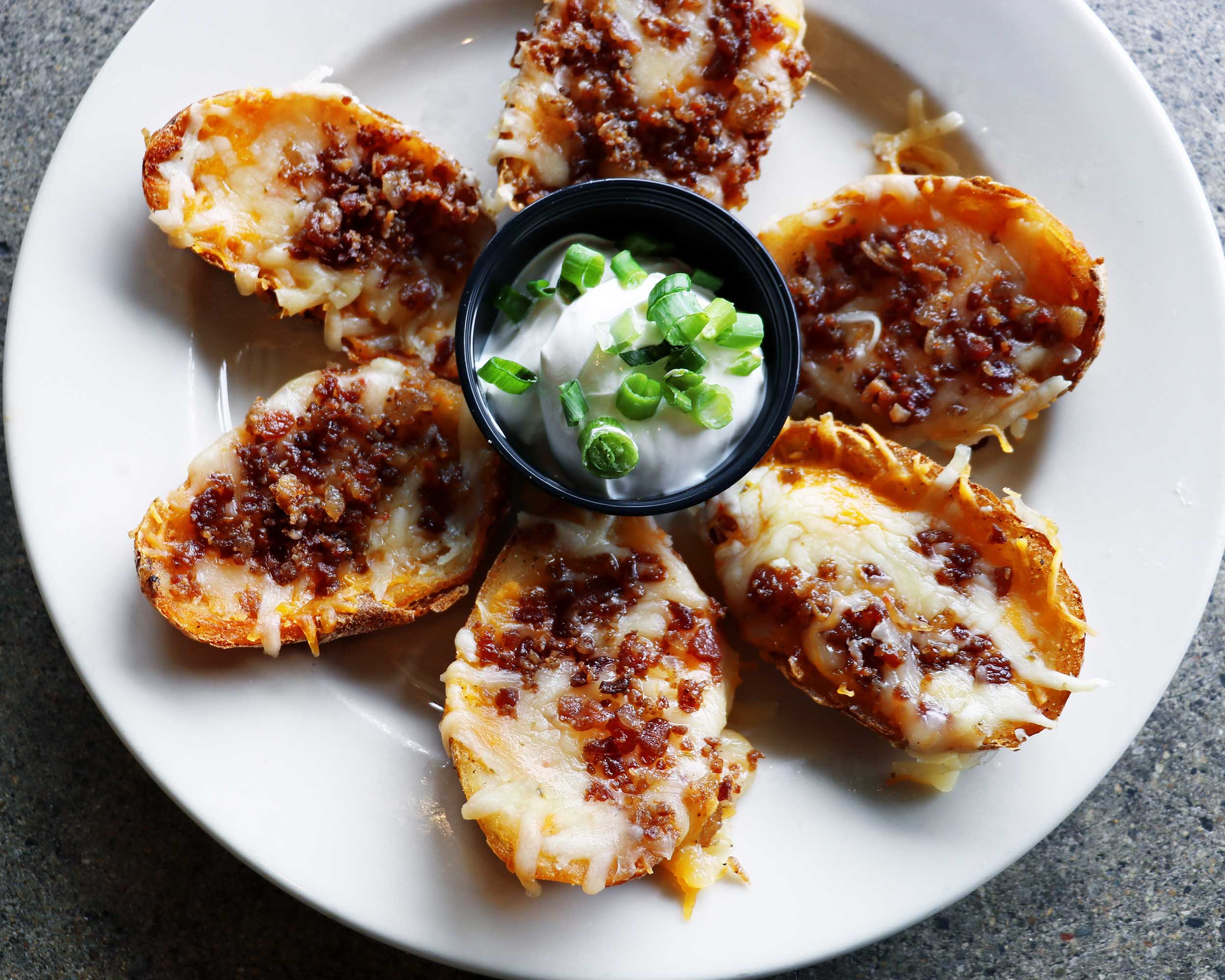 Order Loaded Potato Skins food online from Scotty's brewhouse store, Bloomington on bringmethat.com