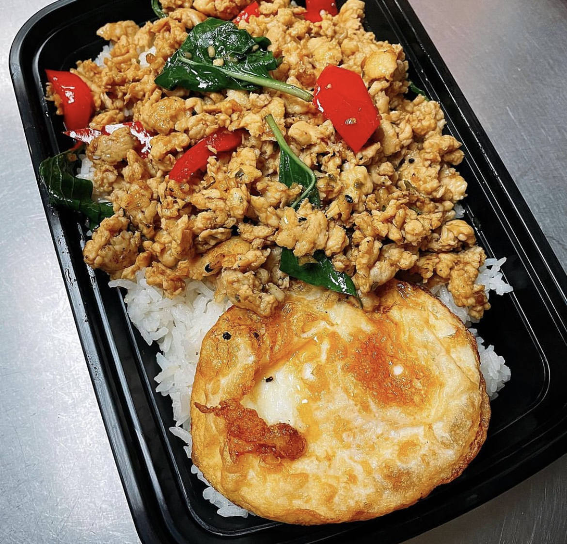 Order Kao Ka Prow with Fried Egg food online from Siam Treasure store, Chicago on bringmethat.com
