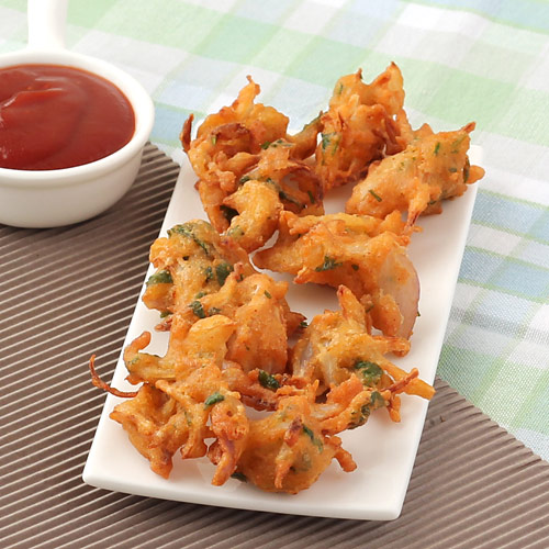 Order Onion Pakora food online from India's Grill store, Los Angeles on bringmethat.com