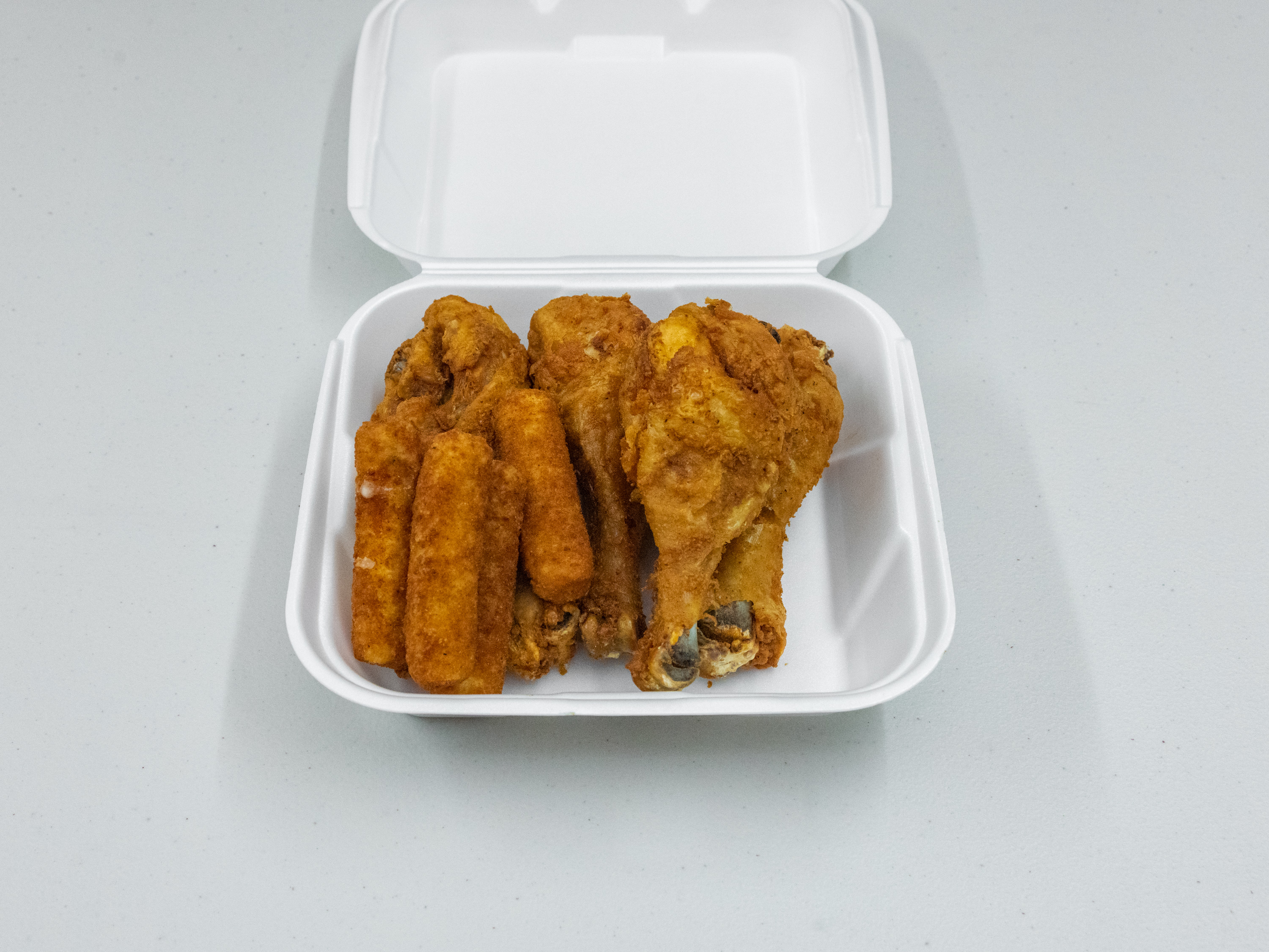 Order 3. Four Piece Chicken Leg Box food online from Dongar Food Mart store, Louisville on bringmethat.com
