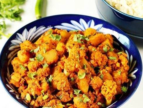 Order Alu gobi food online from Baisakhi Dhaba store, Johnson City on bringmethat.com