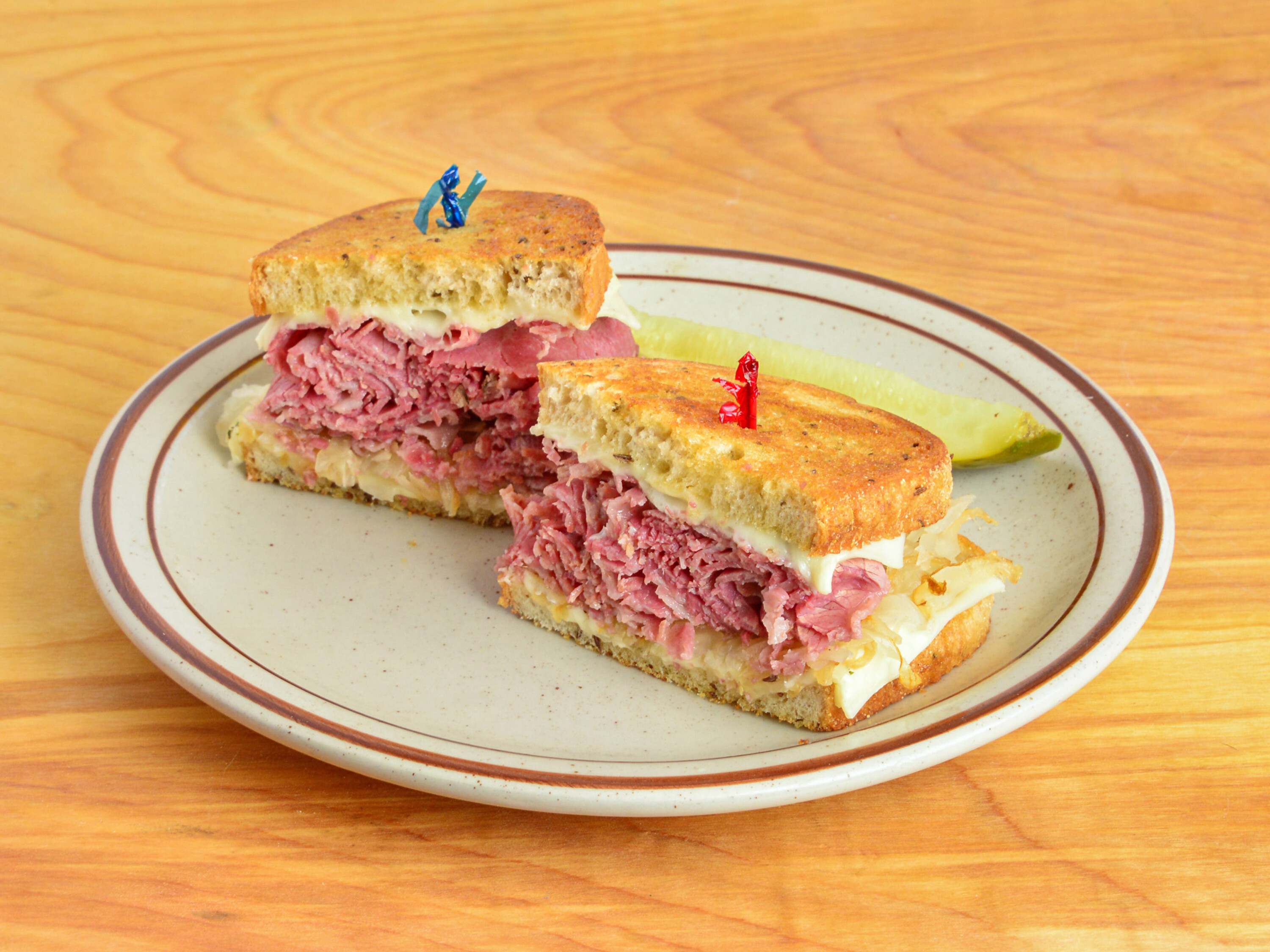 Order Reuben with Swiss food online from Sidewalk Cafe store, Painesville on bringmethat.com