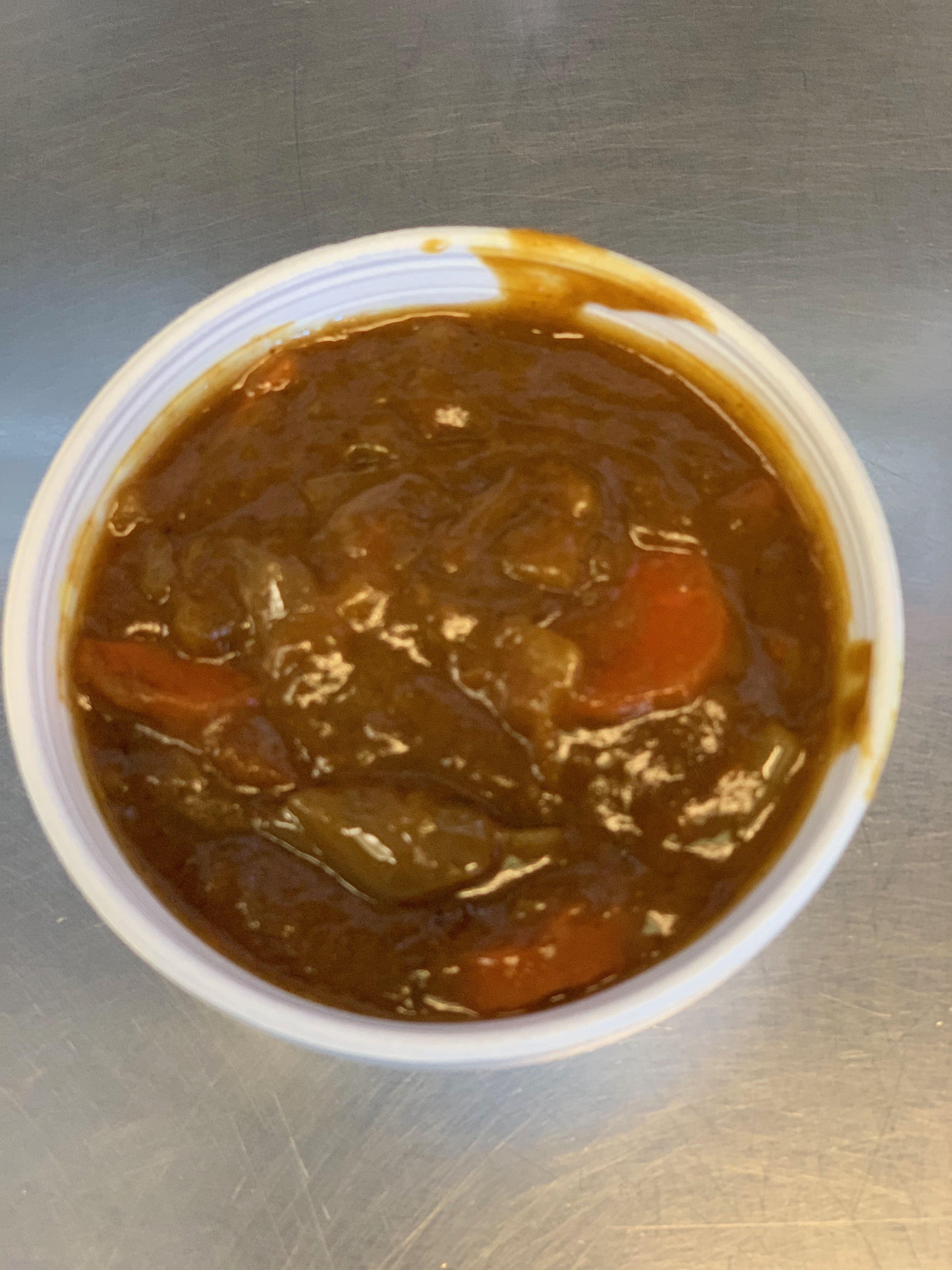 Order Side of Curry Sauce food online from Yoshis Restaurant store, Phoenix on bringmethat.com