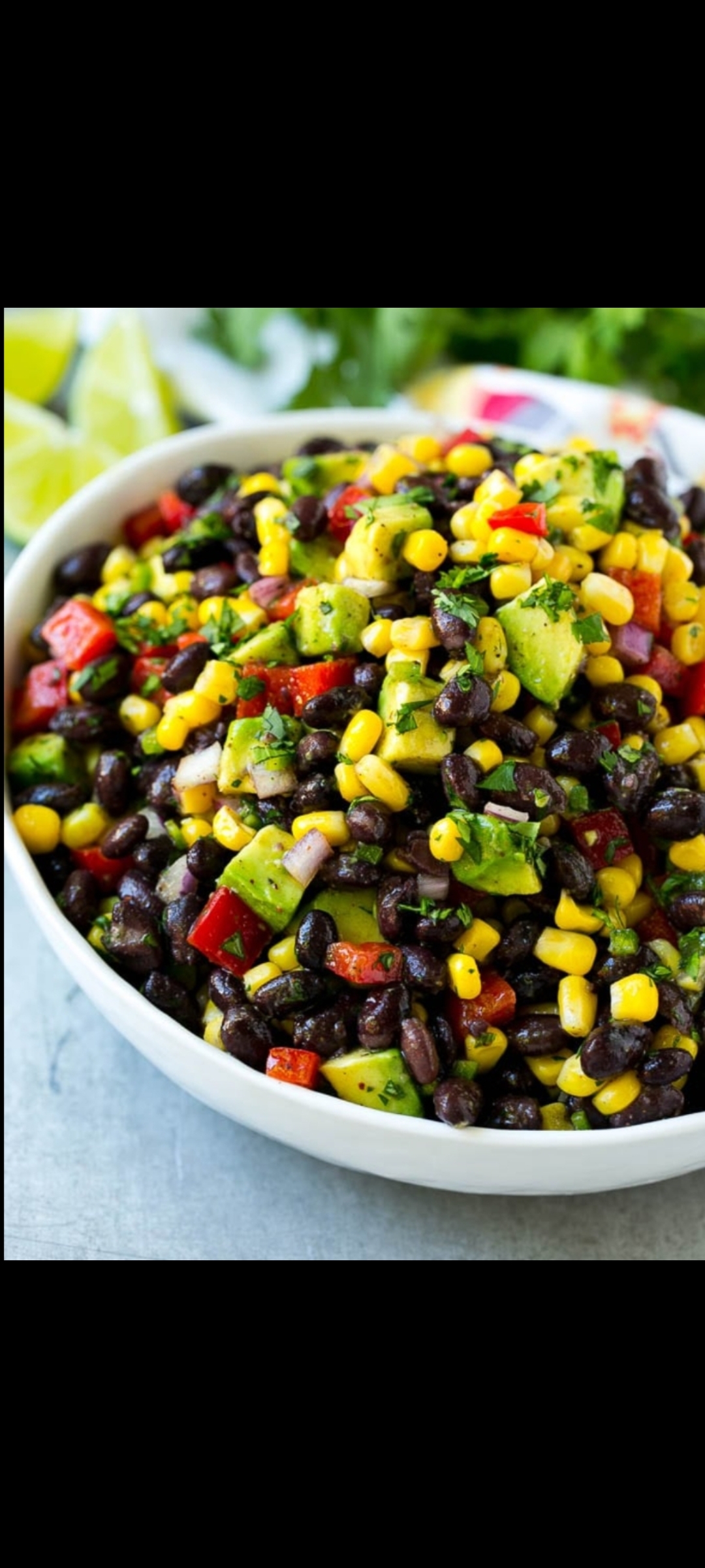 Order Black Beans & Corn Salad Bowl (whole avocado, red onions, green peppers, red peppers, corn, black beans, olive oil, lemon juice celantro, salt and pepper) food online from American Gourmet Foods Deli store, New York on bringmethat.com
