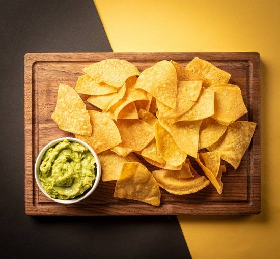 Order Guacamole & Chips food online from Bun Burger Kitchen store, Lakewood on bringmethat.com