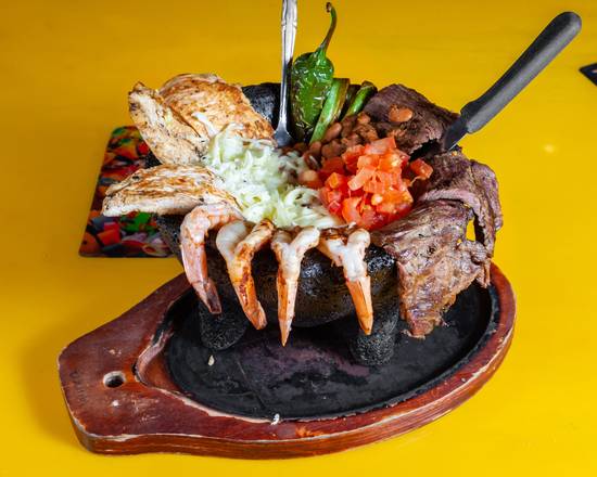 Order Molcajete food online from Ole's Guacamole store, Asheville on bringmethat.com