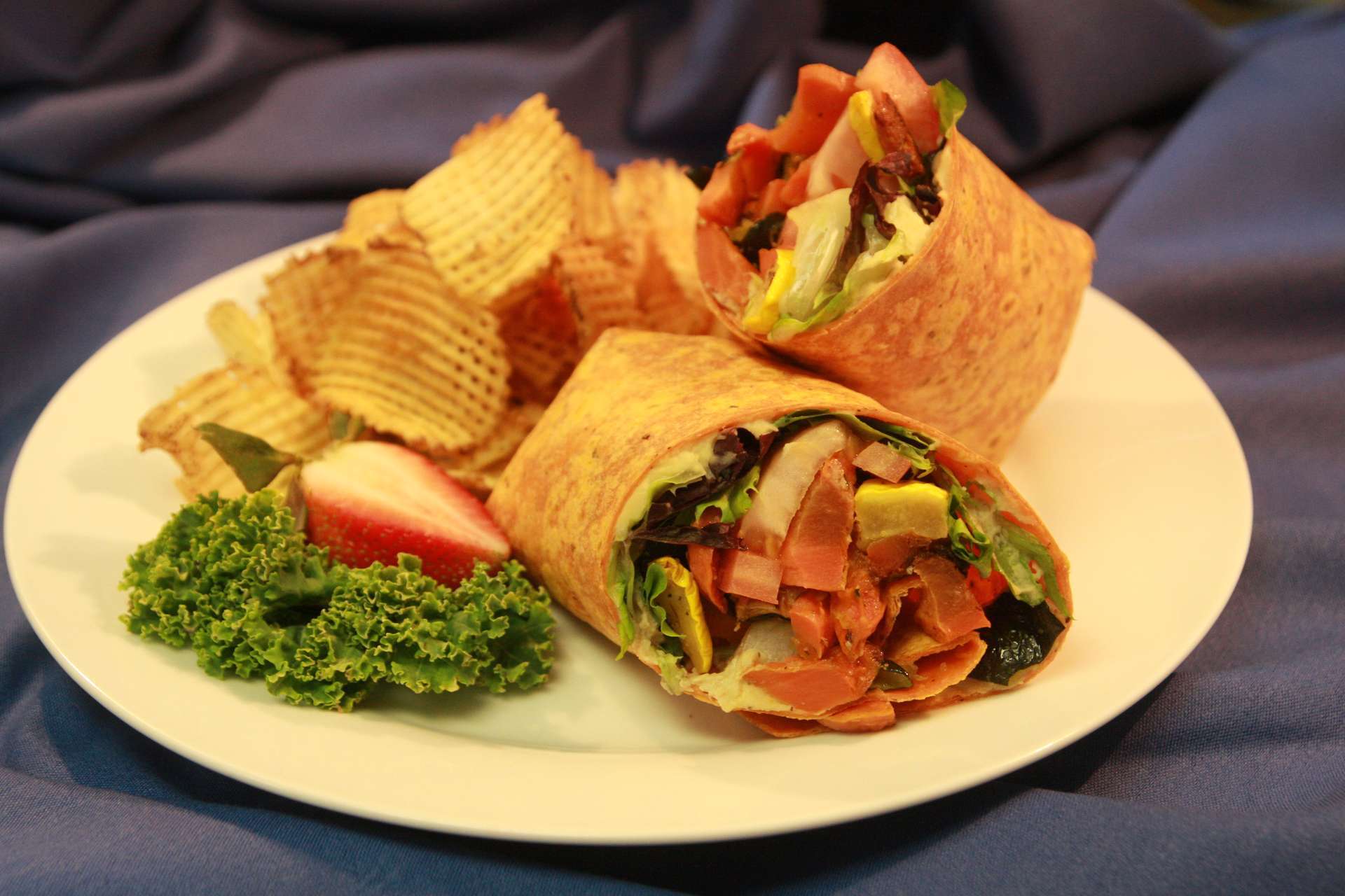 Order Veggie Wrap food online from Celebrations Comfort Kitchen store, Manchester on bringmethat.com