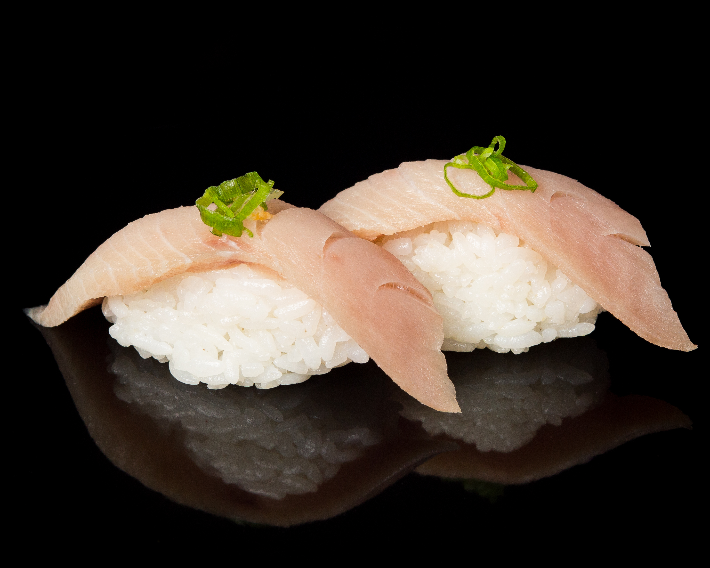 Order 2 Pieces Yellow Tail food online from Sushi Sakura Express store, Houston on bringmethat.com