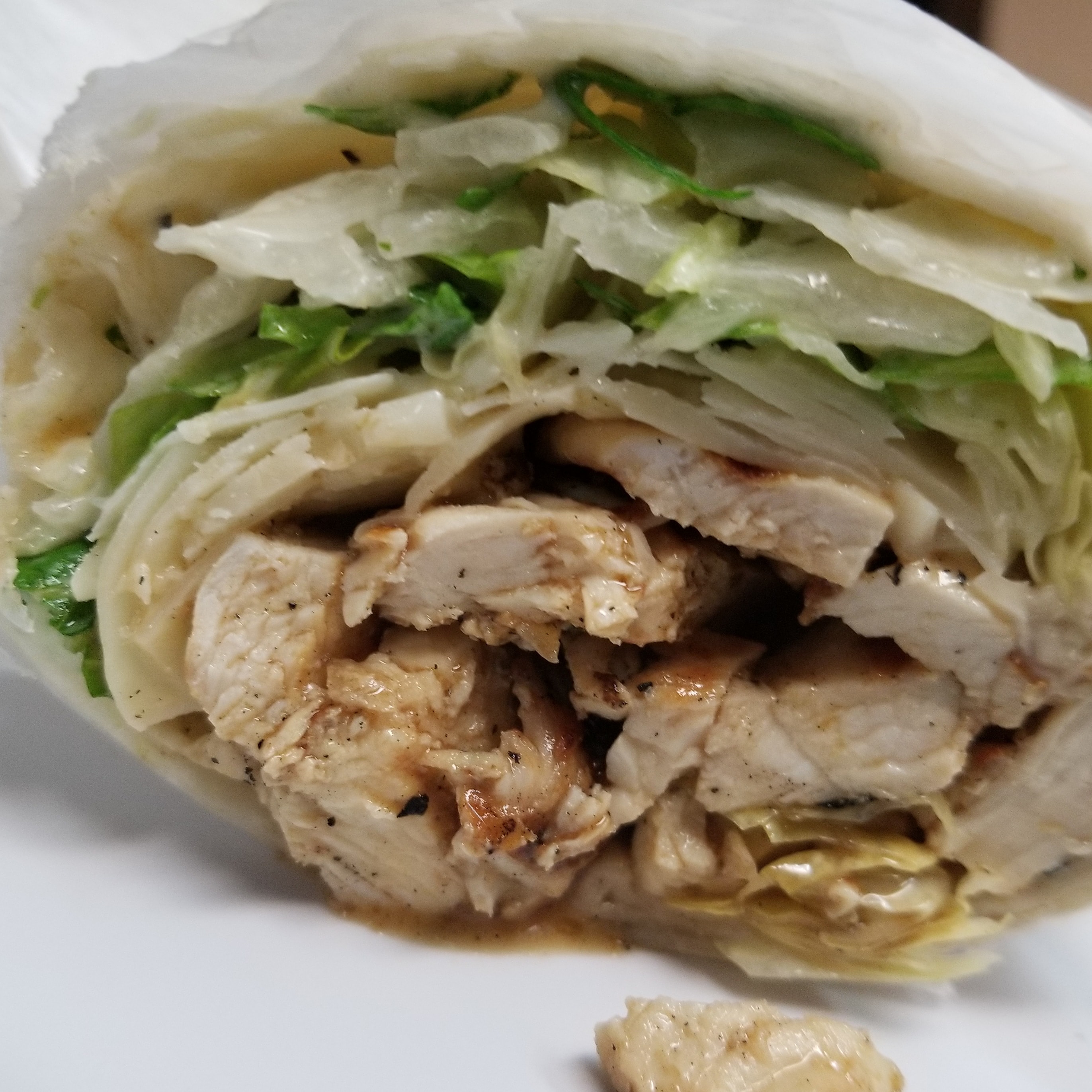 Order Grilled Chicken Caesar Wrap food online from Pizzarelli's Pizza store, Scarsdale on bringmethat.com