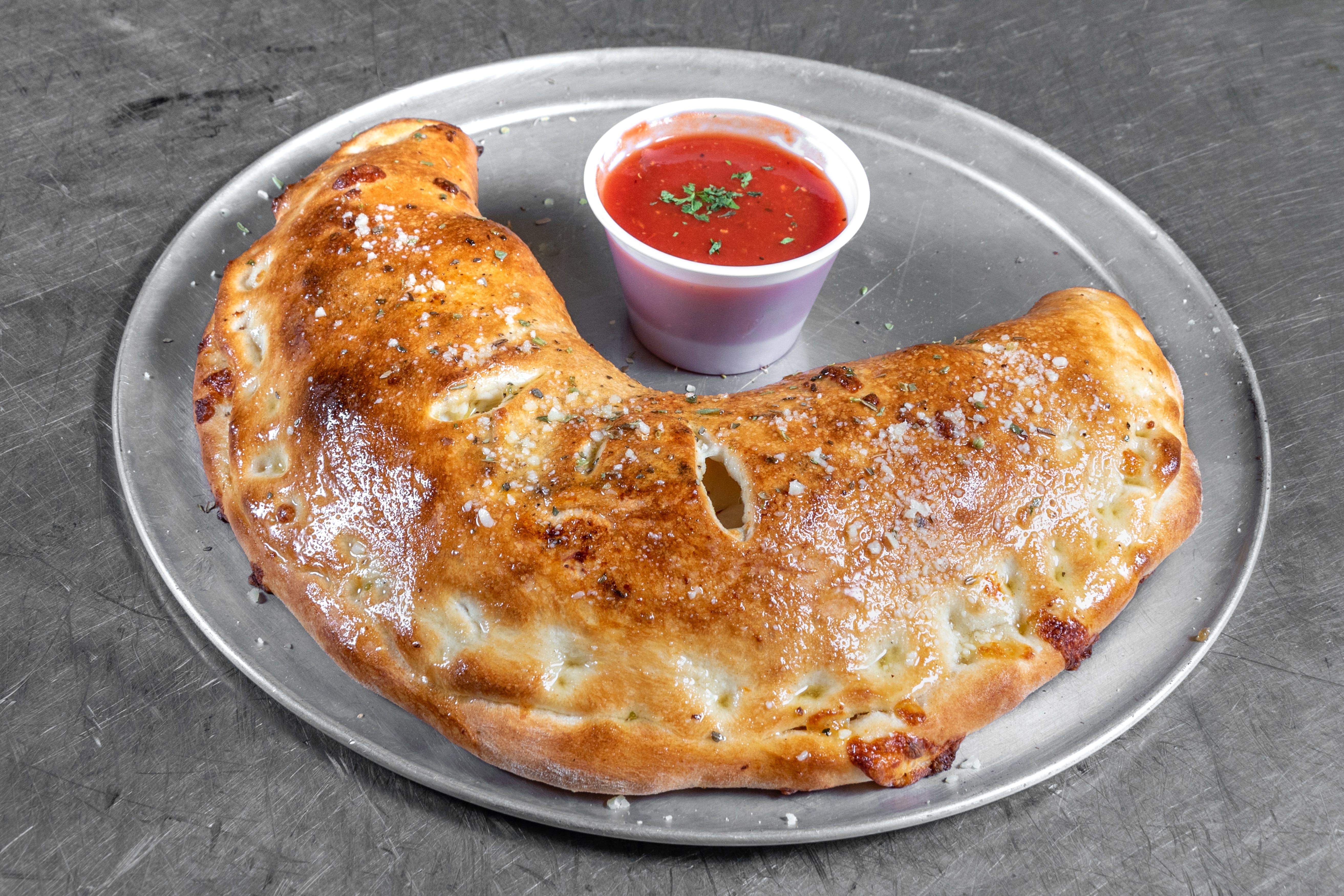 Order Calzone - Calzone food online from Goodfella Pizza store, Los Lunas on bringmethat.com