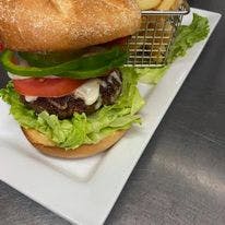 Order Cheeseburger - Burger food online from Noli's Restaurant store, Winsted on bringmethat.com