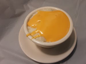 Order CUP OF GRITS W/ CHEESE food online from Millers Country Kitchen store, Middletown on bringmethat.com