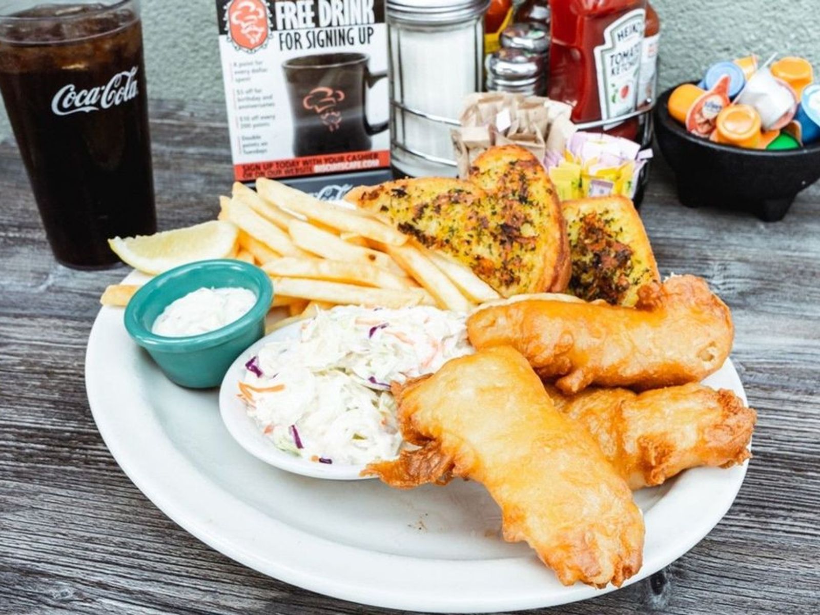 Order Fresh Battered Fish & Chips - OO food online from Biscuits Cafe store, Chandler on bringmethat.com
