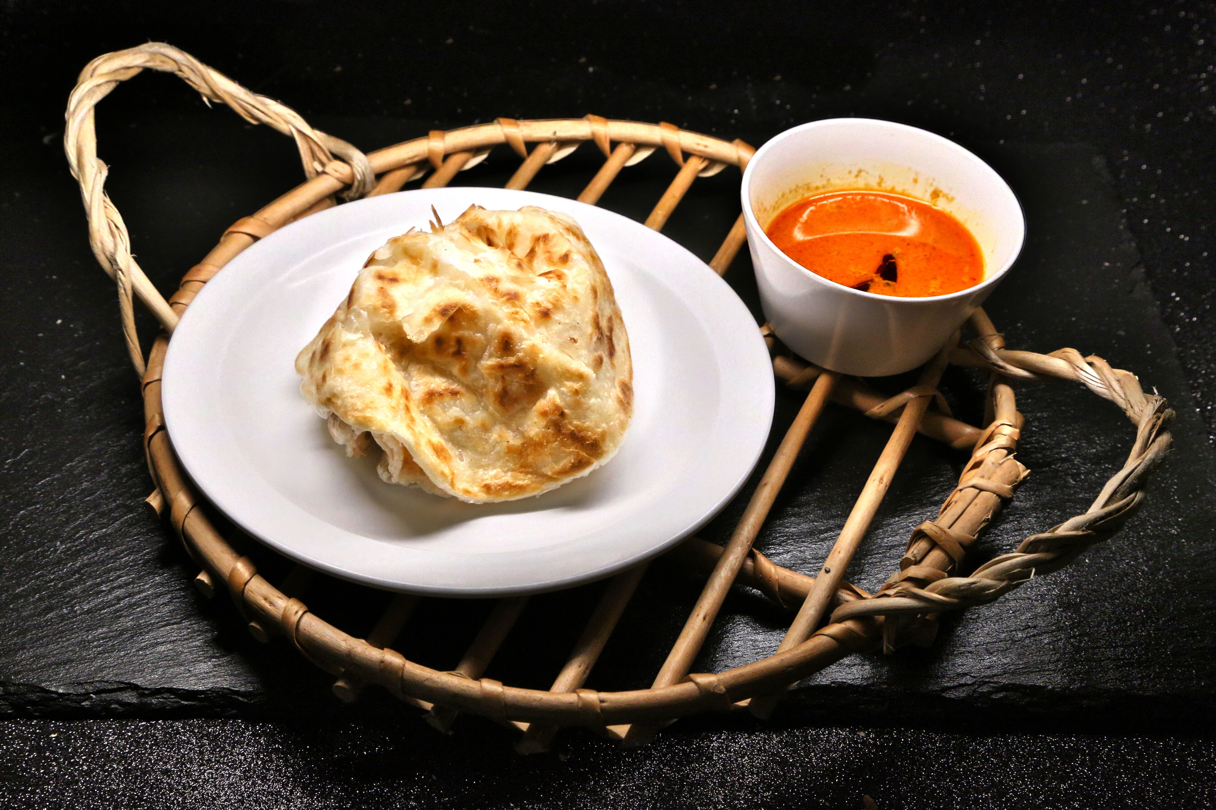 Order A3. Roti Canai food online from Singapore Cafe store, Sugar Land on bringmethat.com